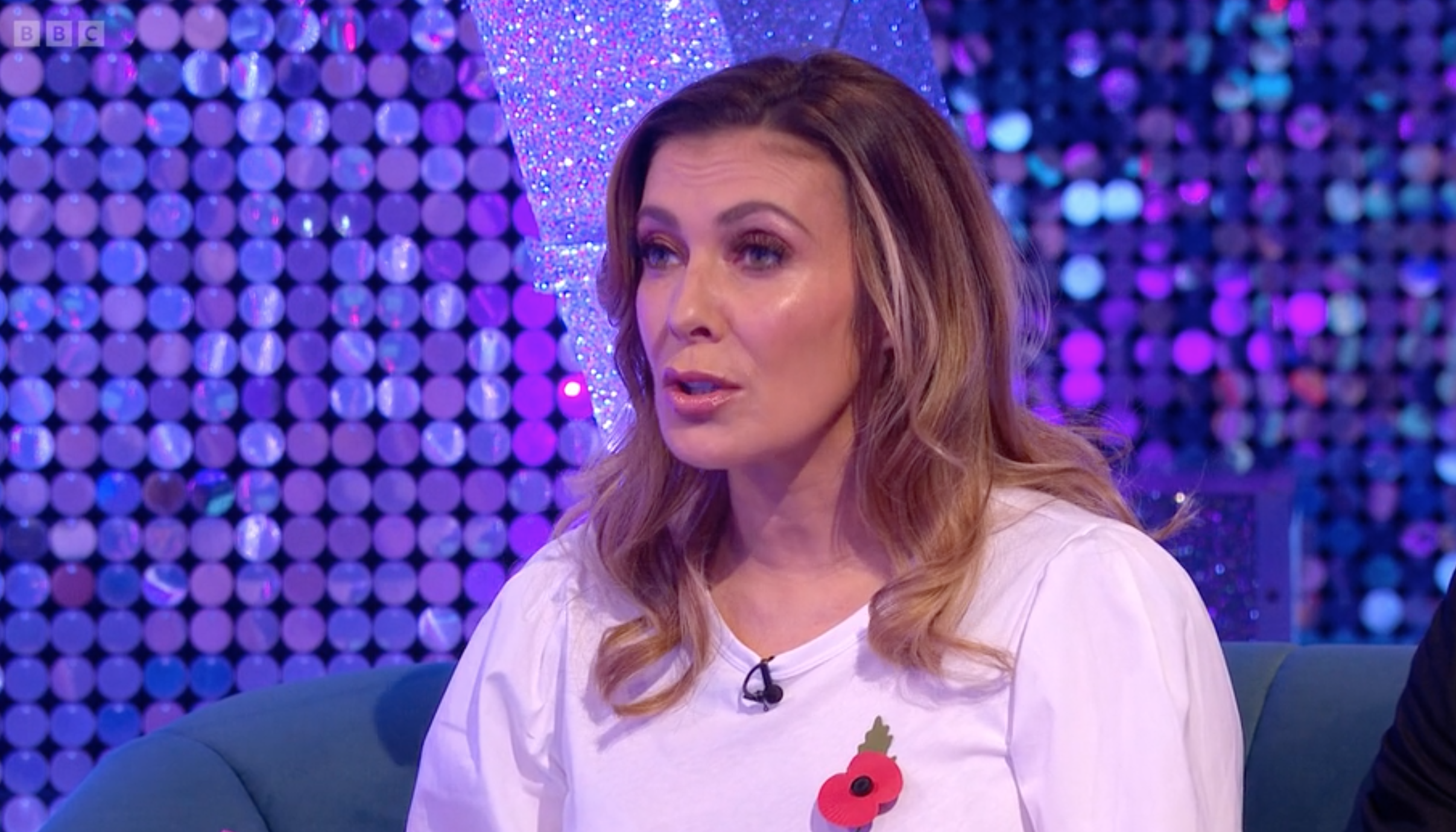 Kym Marsh wearing white and chatting about Strictly