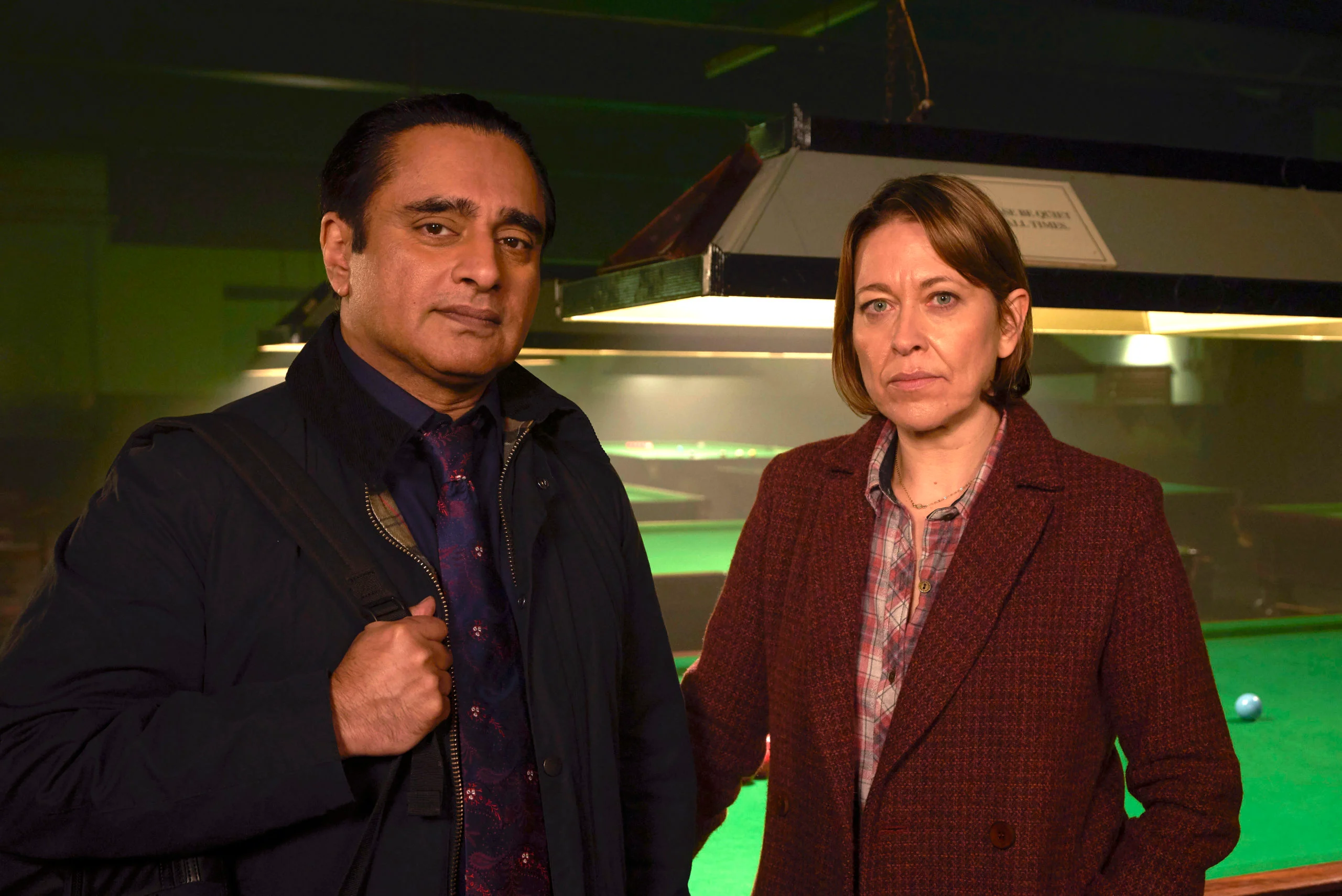 Sanjeev Bhaskar and Nicola Walker in character on the set of Unforgotten