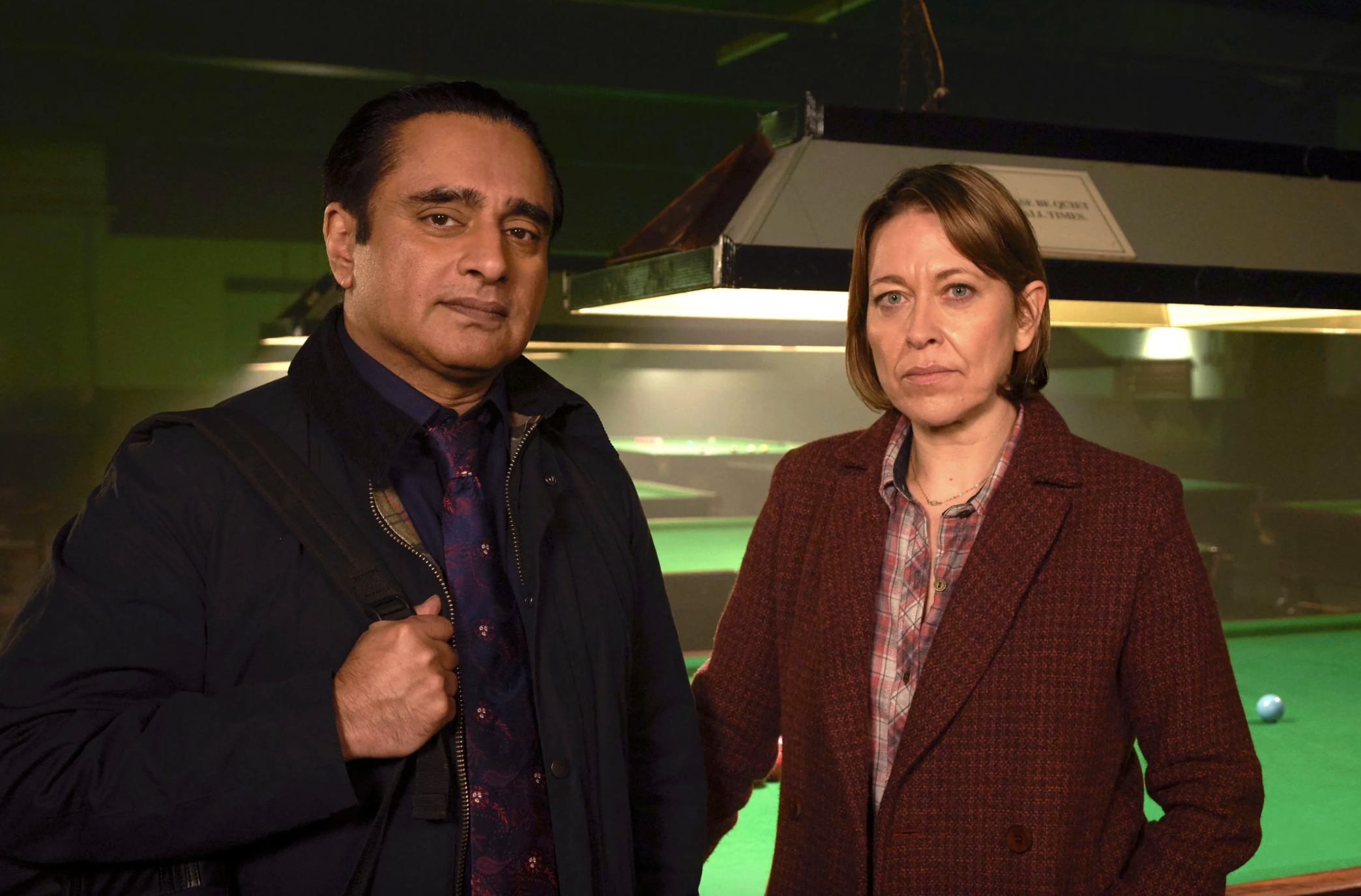 Sanjeev Bhaskar and Nicola Walker in character on the set of Unforgotten