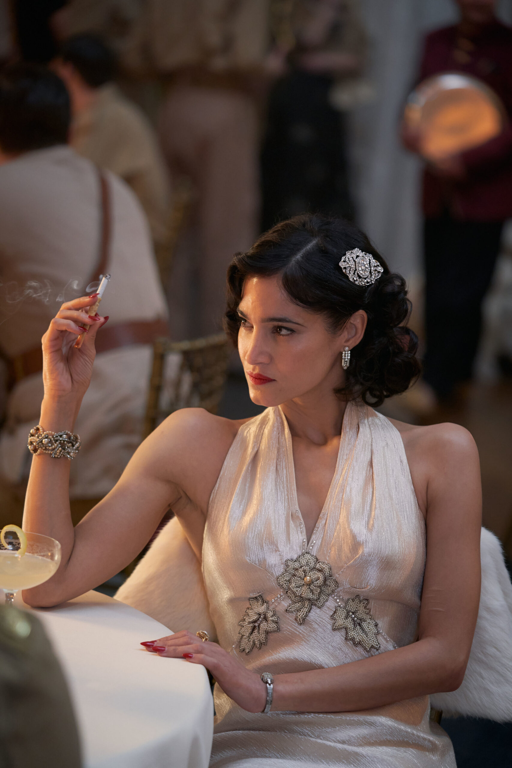 Eve wearing a white dress in the BBC One drama