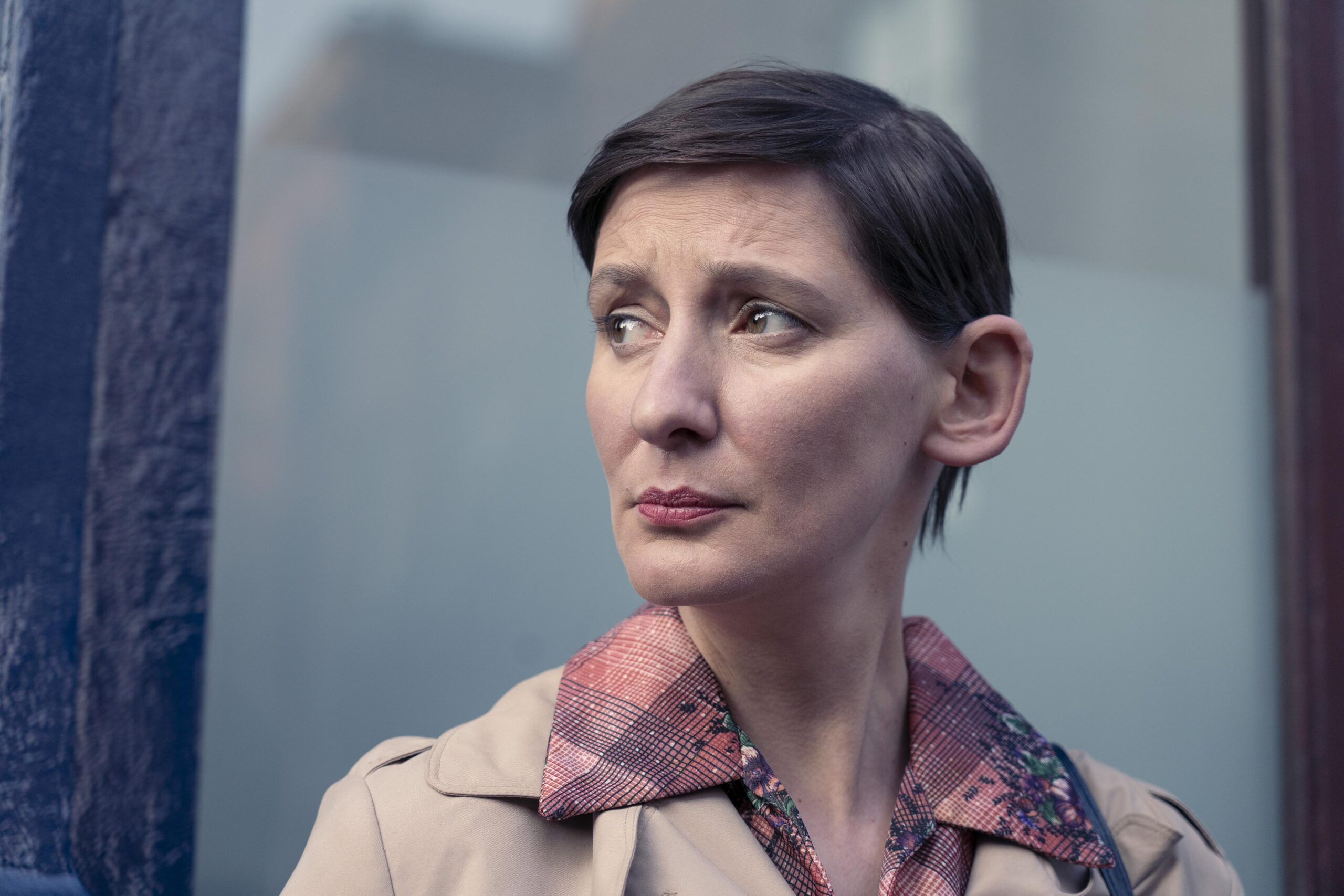 Miss Matlock looks to her left with a frown