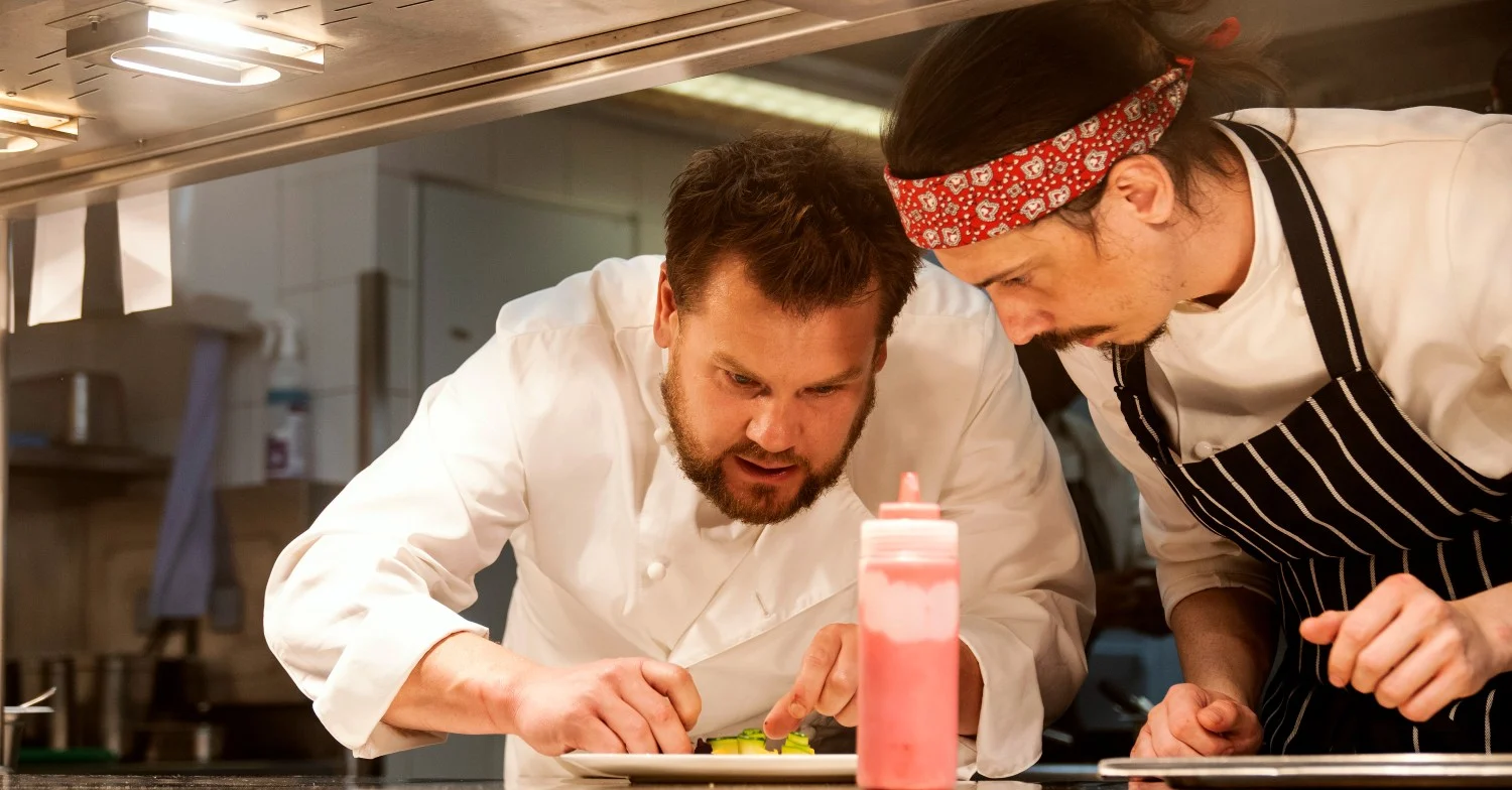 James Corden in chef's whites in character as Jamie in Mammals