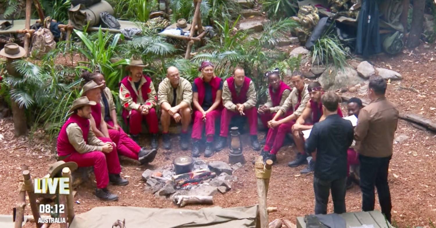 Boy George and Matt Hancock sit with other contestants