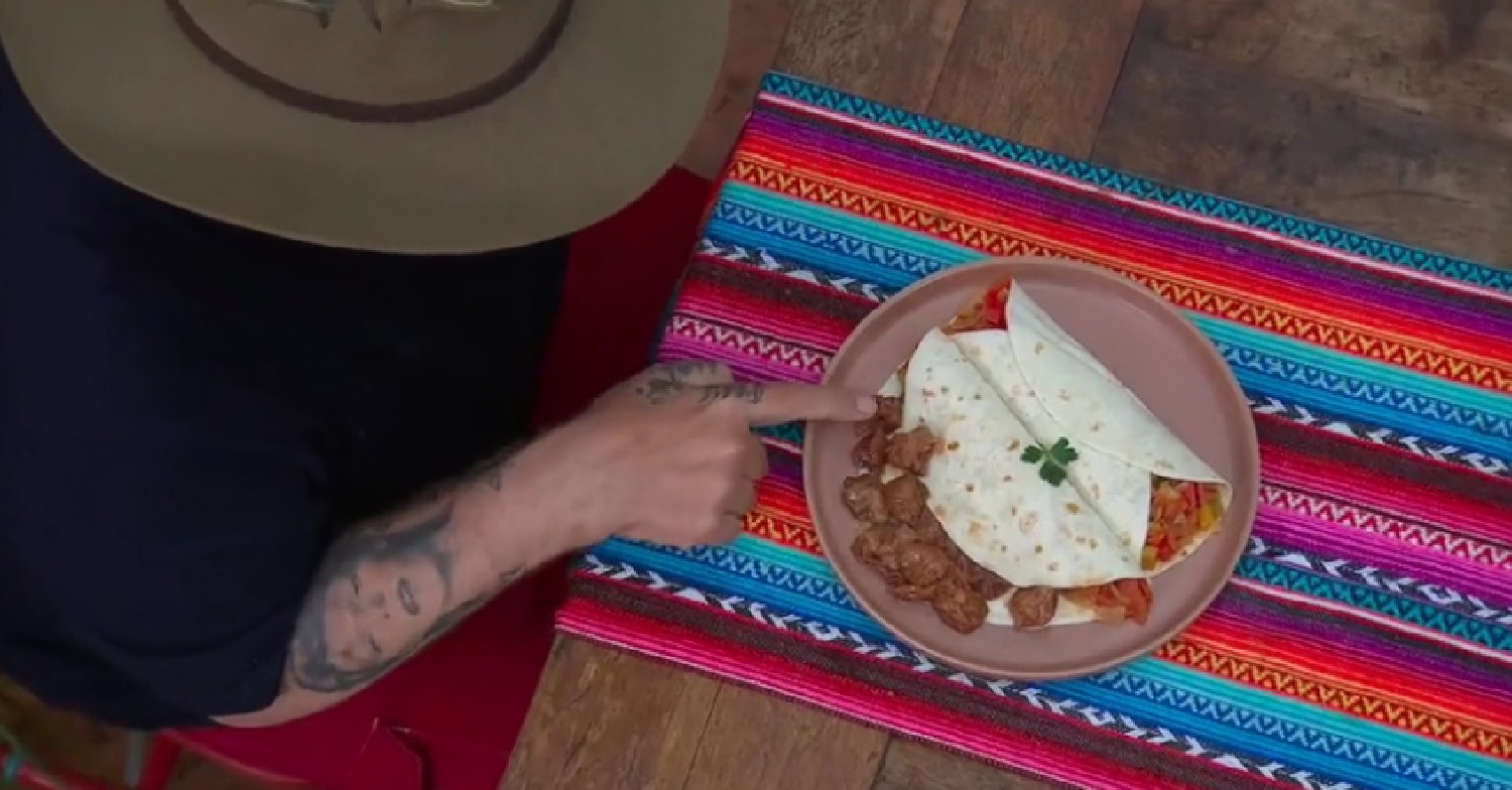 Boy George points at fermented plums on I'm A Celebrity