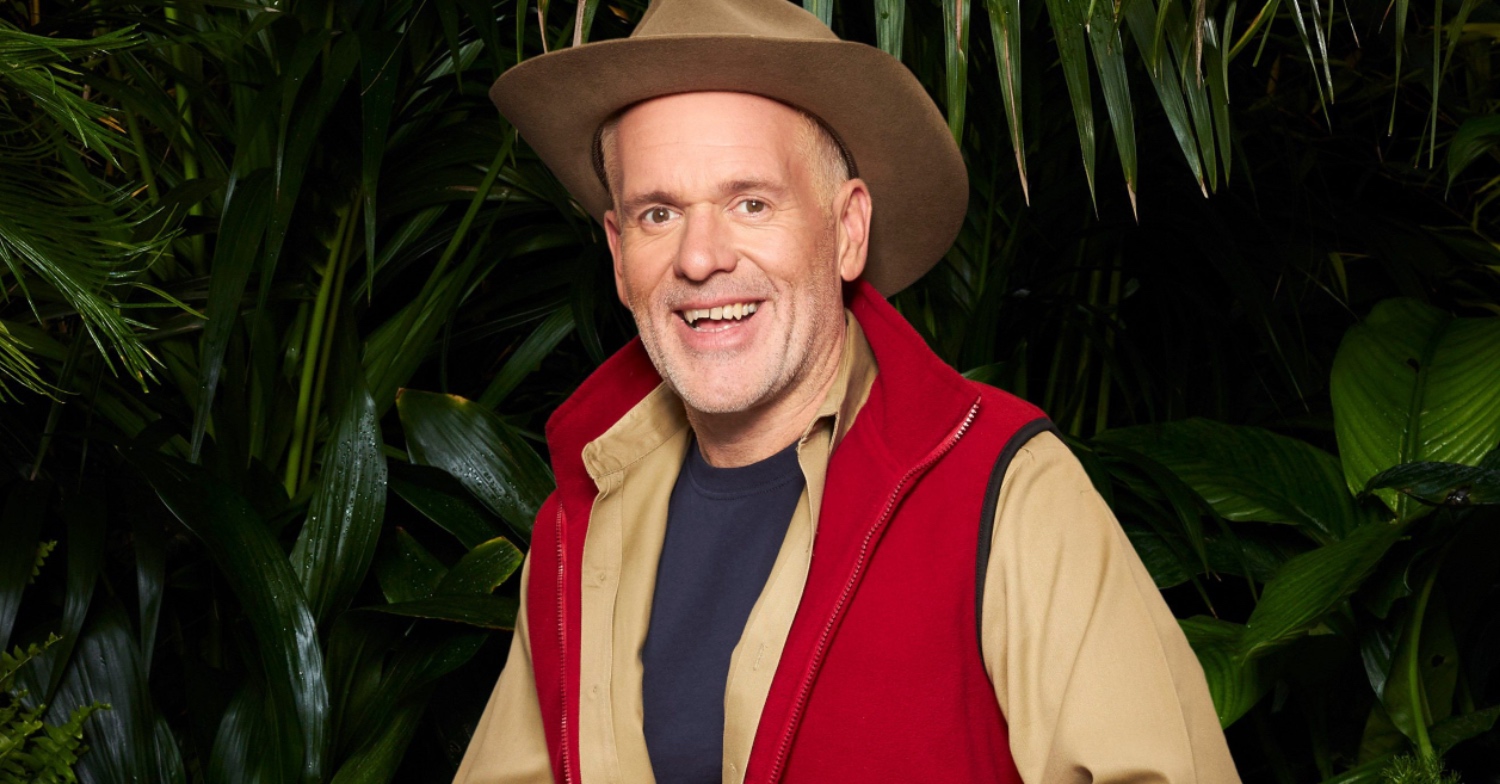 Chris Moyles posing in his I'm A Celebrity clothing