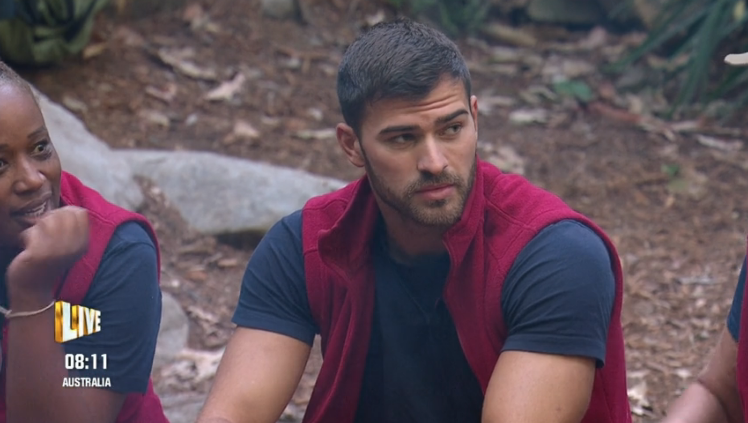 Owen Warner sitting in the I'm A Celebrity campy