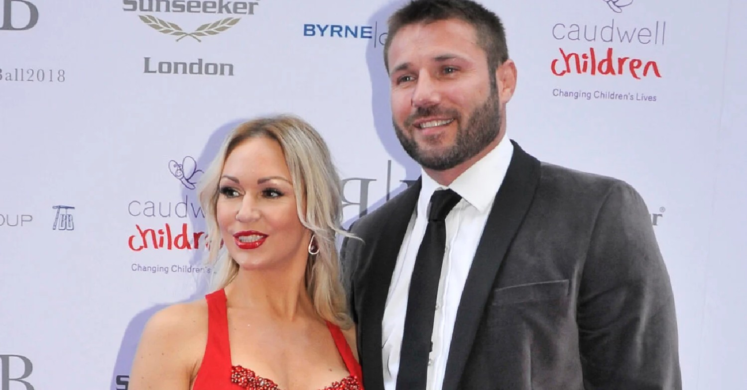 Ben Cohen and Kristina Rihanoff smiling at event