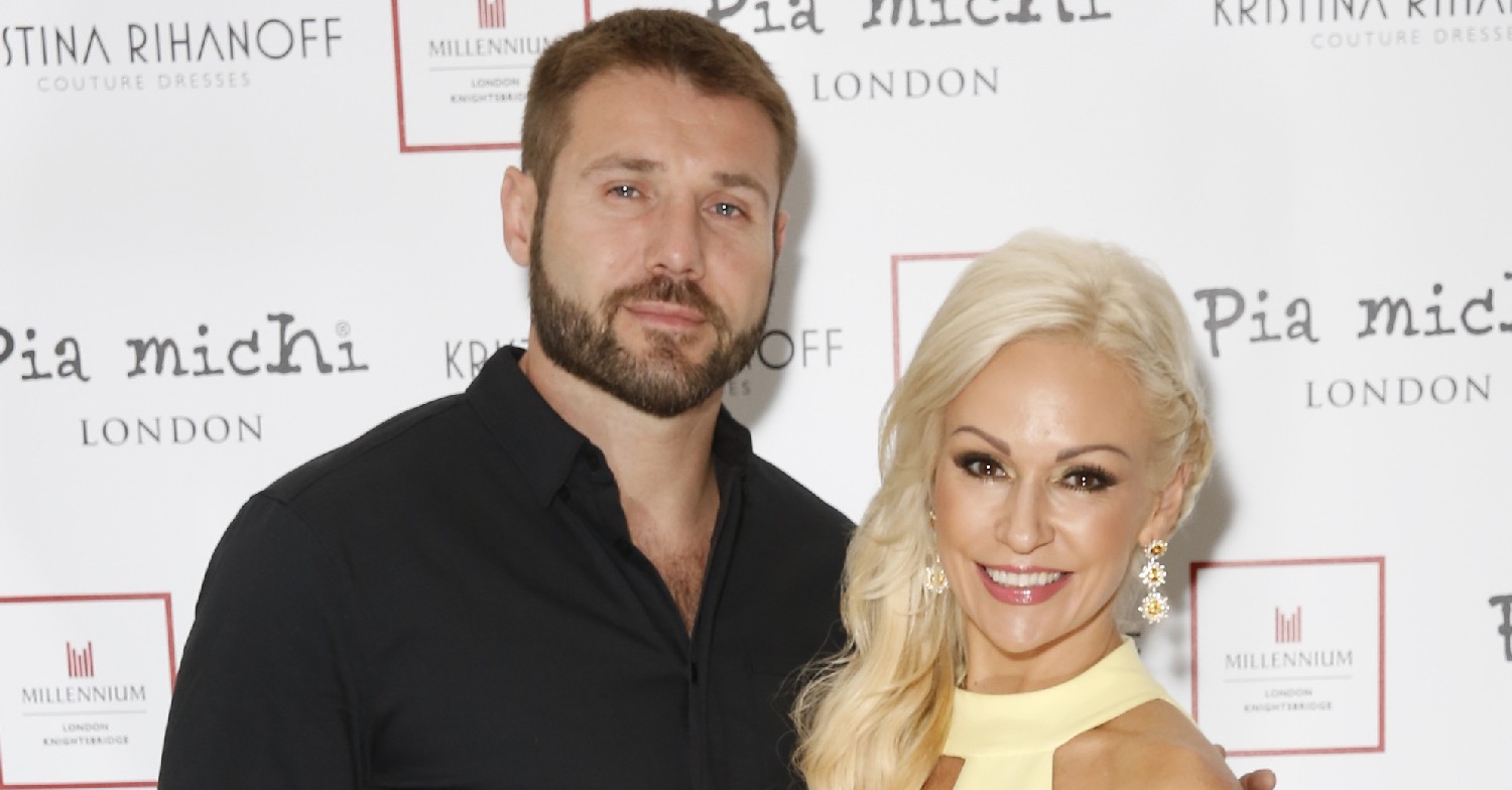 Ben Cohen and Kristina Rihanoff smiling at event
