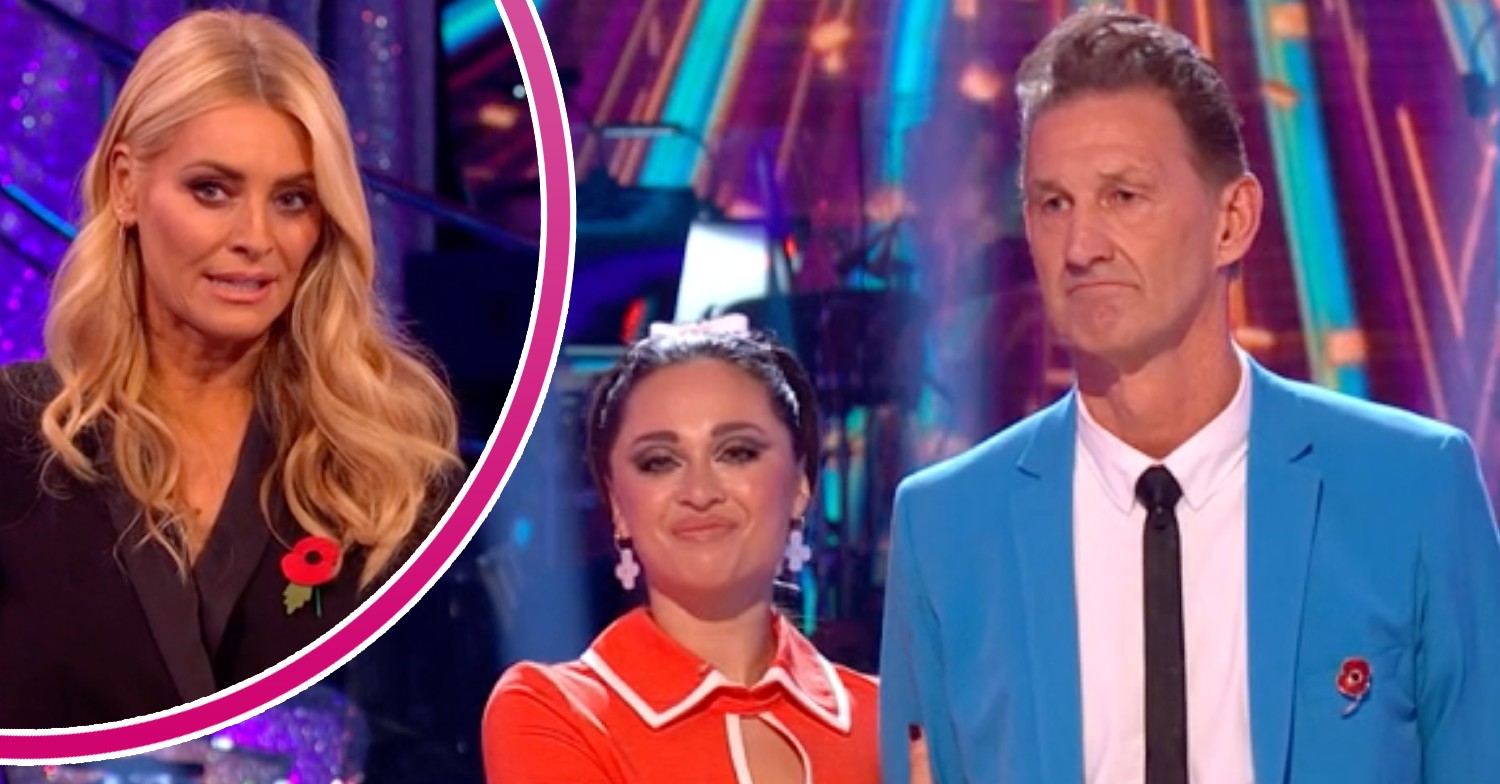 Strictly host Tess Daly looks serious, Katya Jones and Tony Adams look resigned