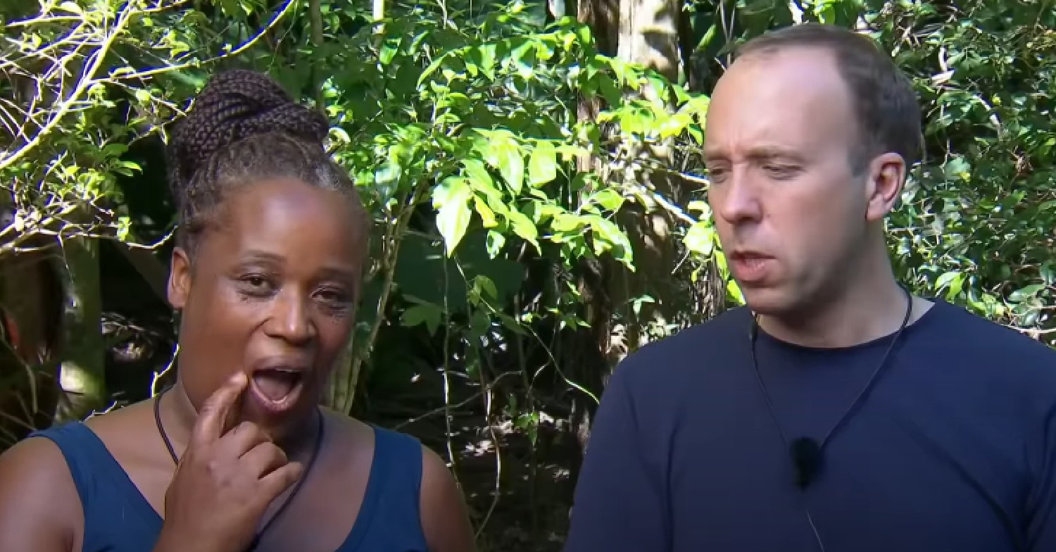 Charlene White itching face as Matt Hancock talks in jungle