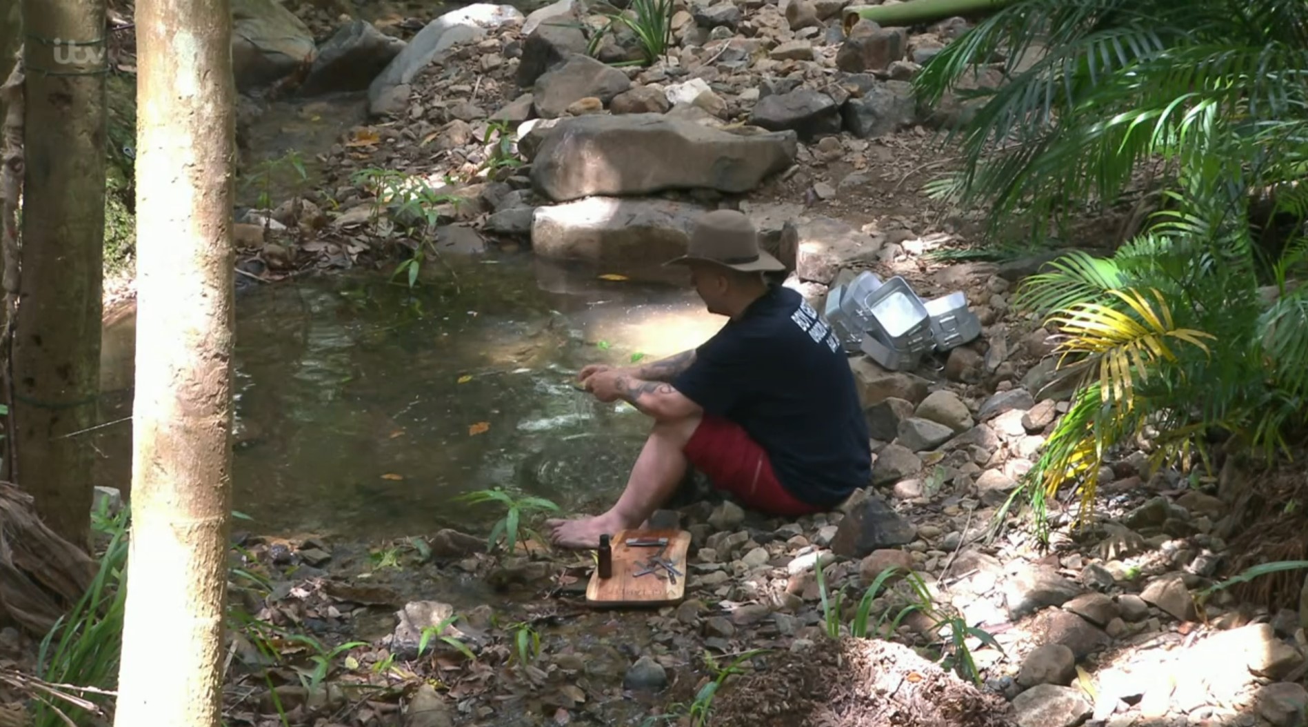 Boy George washing dishes on I'm A Celebrity
