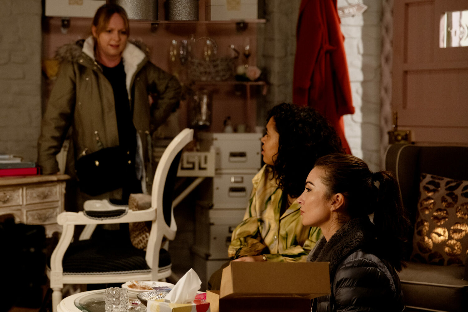 Vanessa glares angrily at Suzy and Leyla in Emmerdale