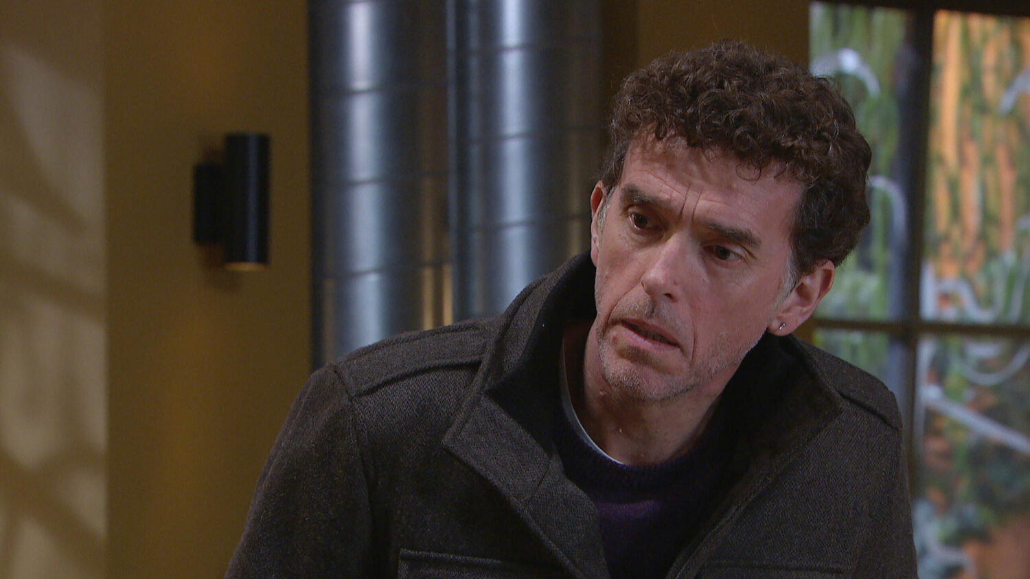 Marlon looking worried in Emmerdale 