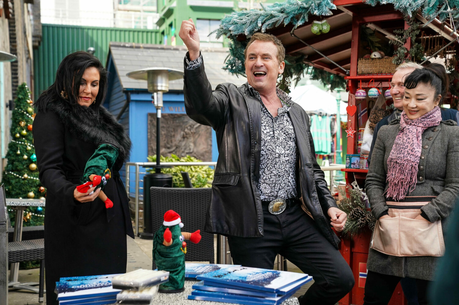 Kat Slater looks impressed as joyous Alfie Moon makes sales on the market
