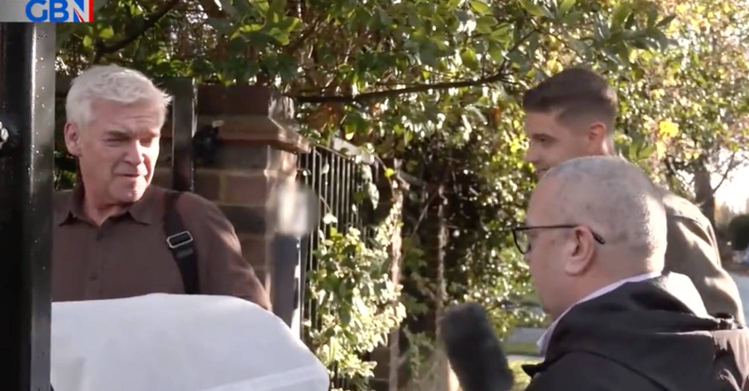 Phillip Schofield responds to questions about the Queen after getting out of a car