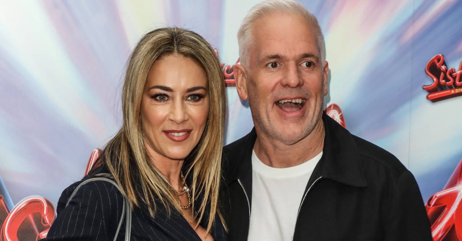 I'm A Celeb contestant Chris Moyles poses for cameras with girlfriend Tiffany Austin