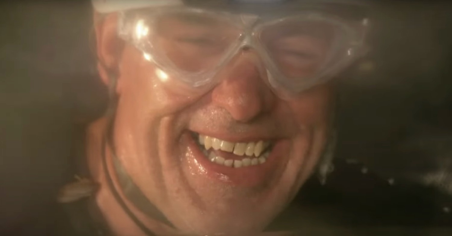 Chris Moyles laughing during his trial on I'm A Celebrity