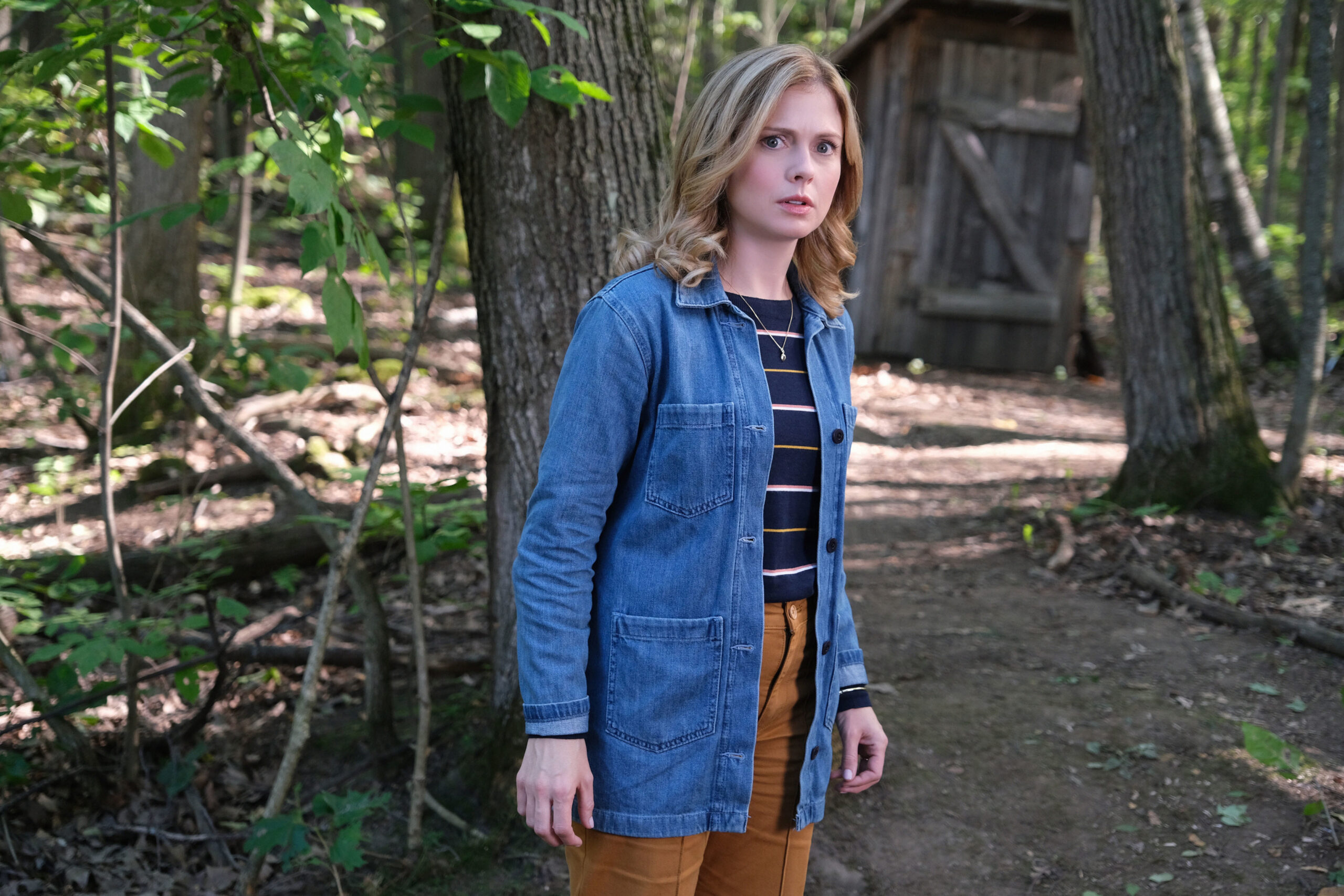 Sam looks confused as she stands outside in Ghosts US