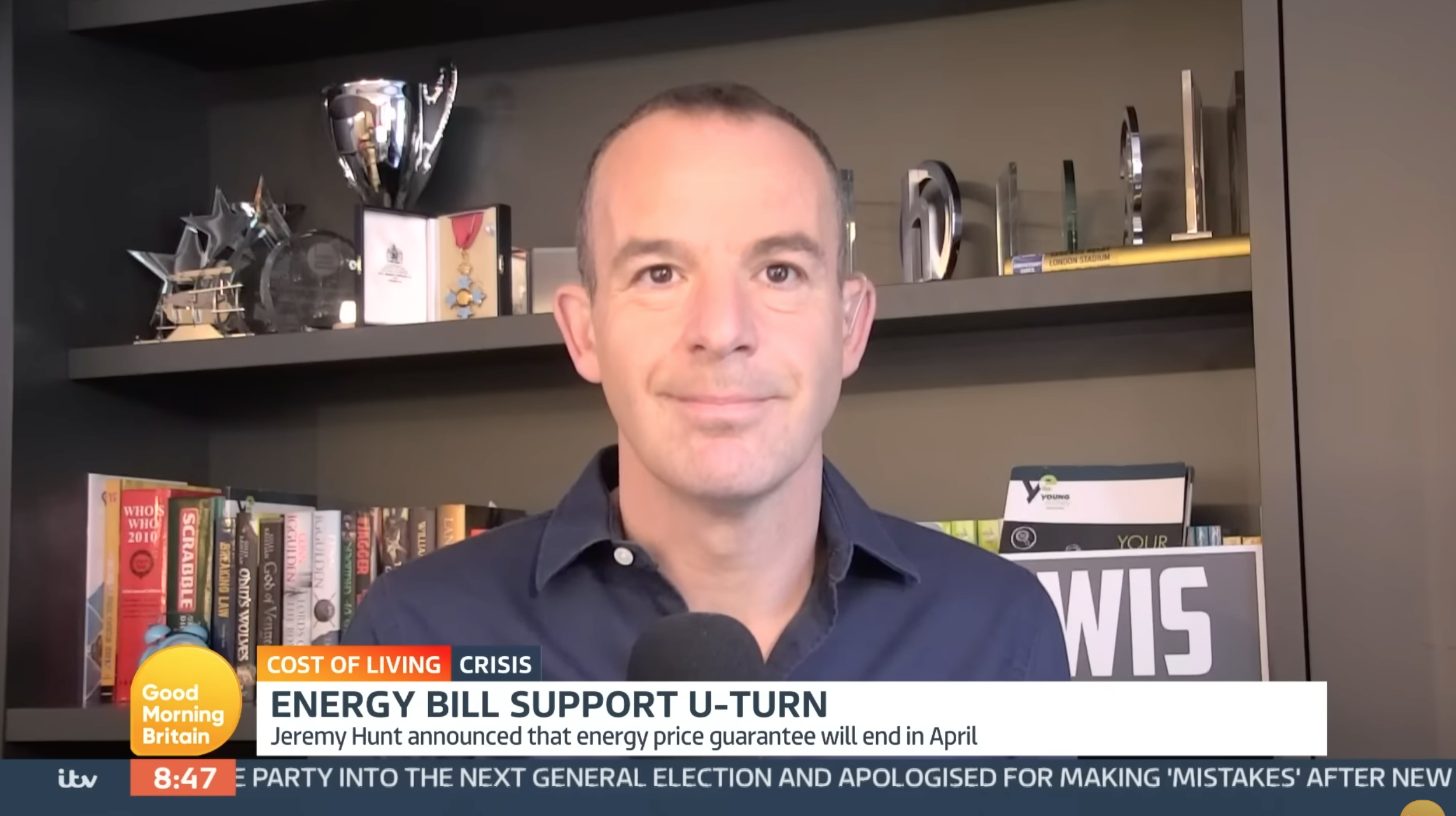 Martin Lewis looking straight faced on GMB