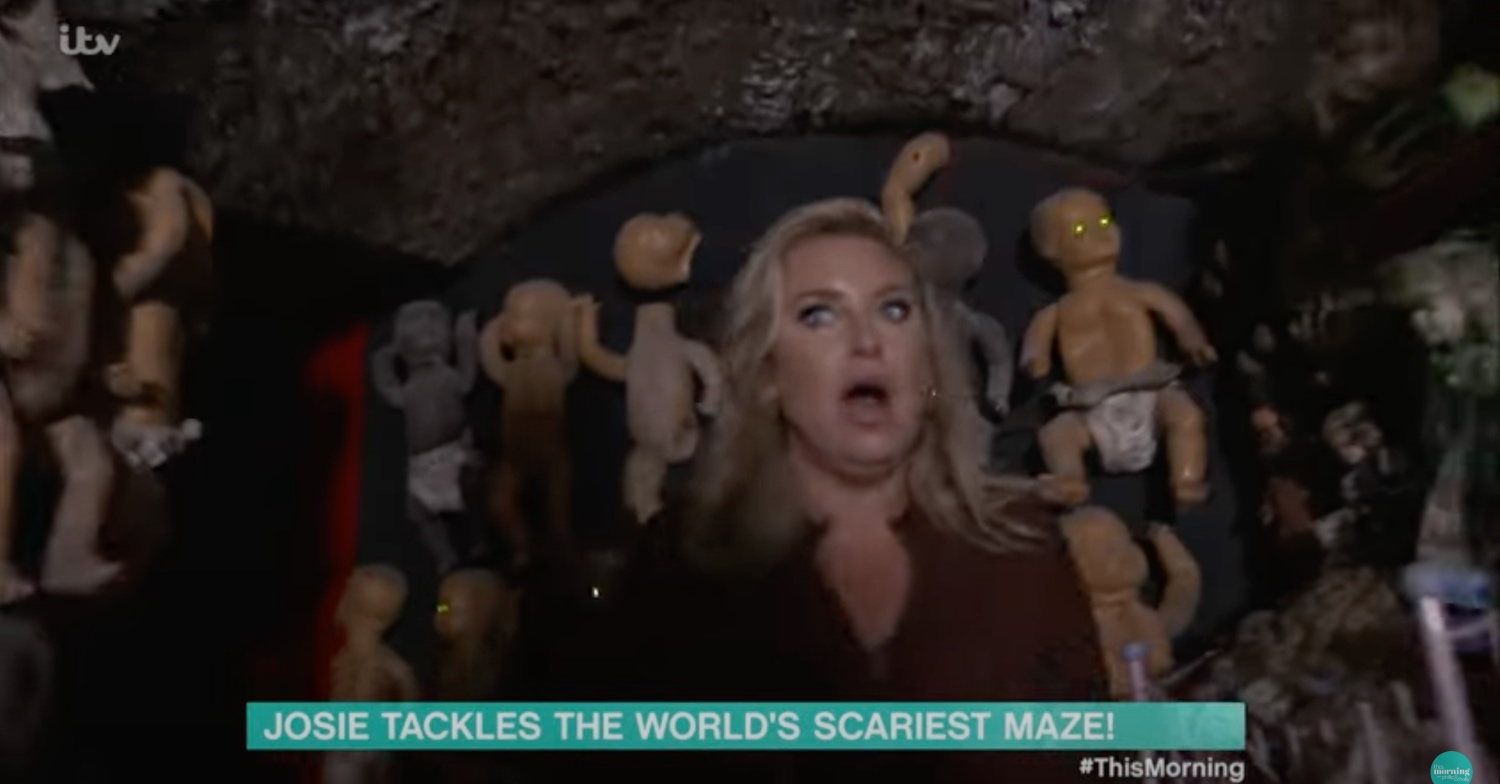Josie Gibson in the haunted house looking scared