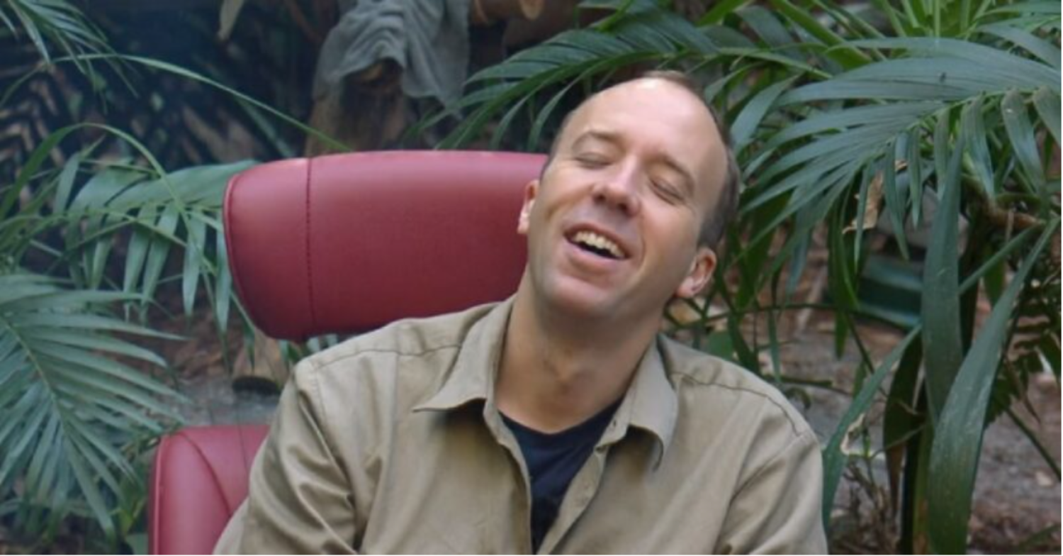 Matt Hancock laughs in the I'm A Celeb camp