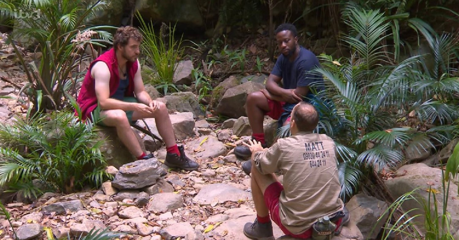Seann Walsh, Babatunde and Matt Hancock speaking in the jungle