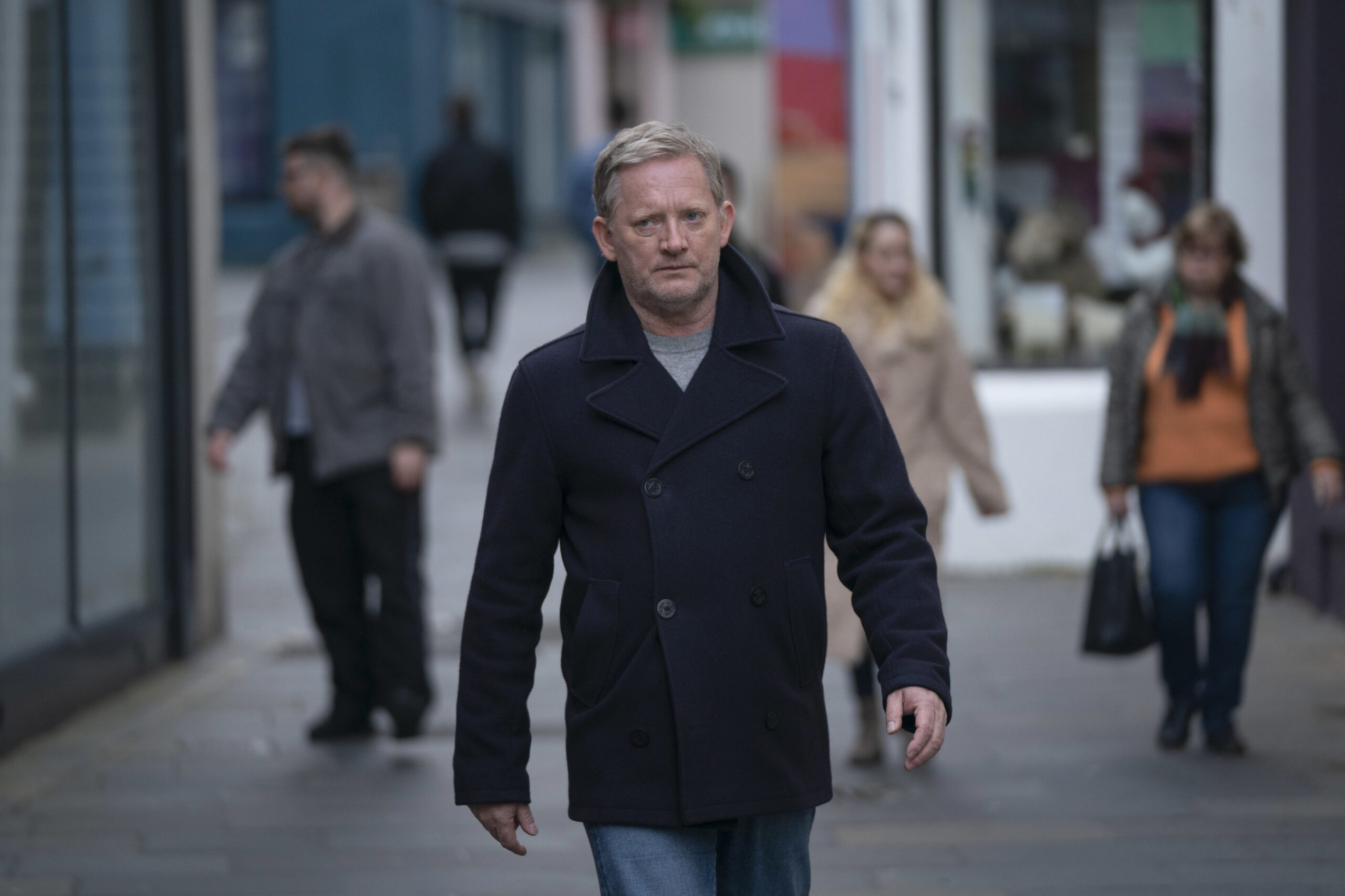 Jimmy Perez walks down a street in Shetland