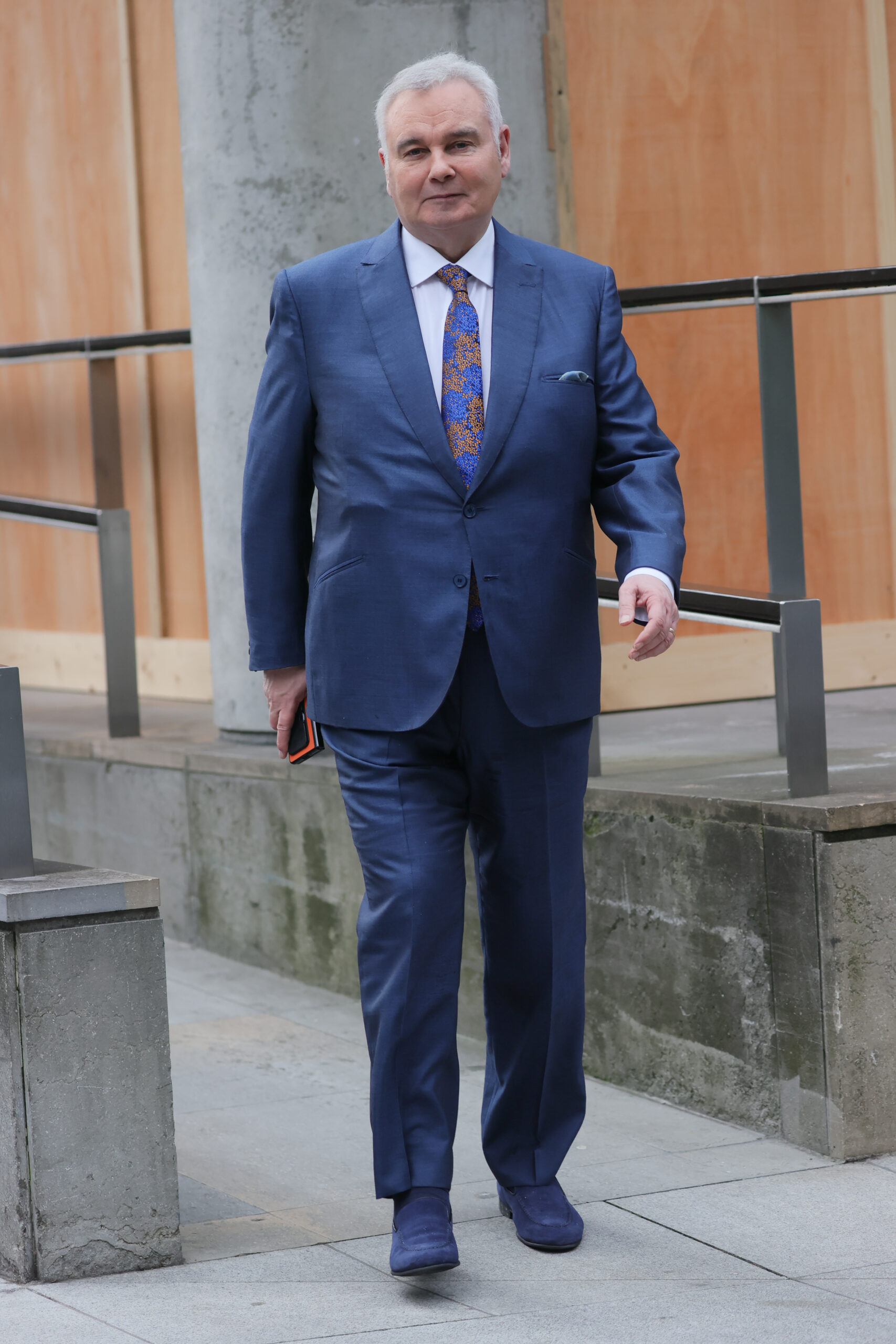 Eamonn Holmes wearing a navy suit
