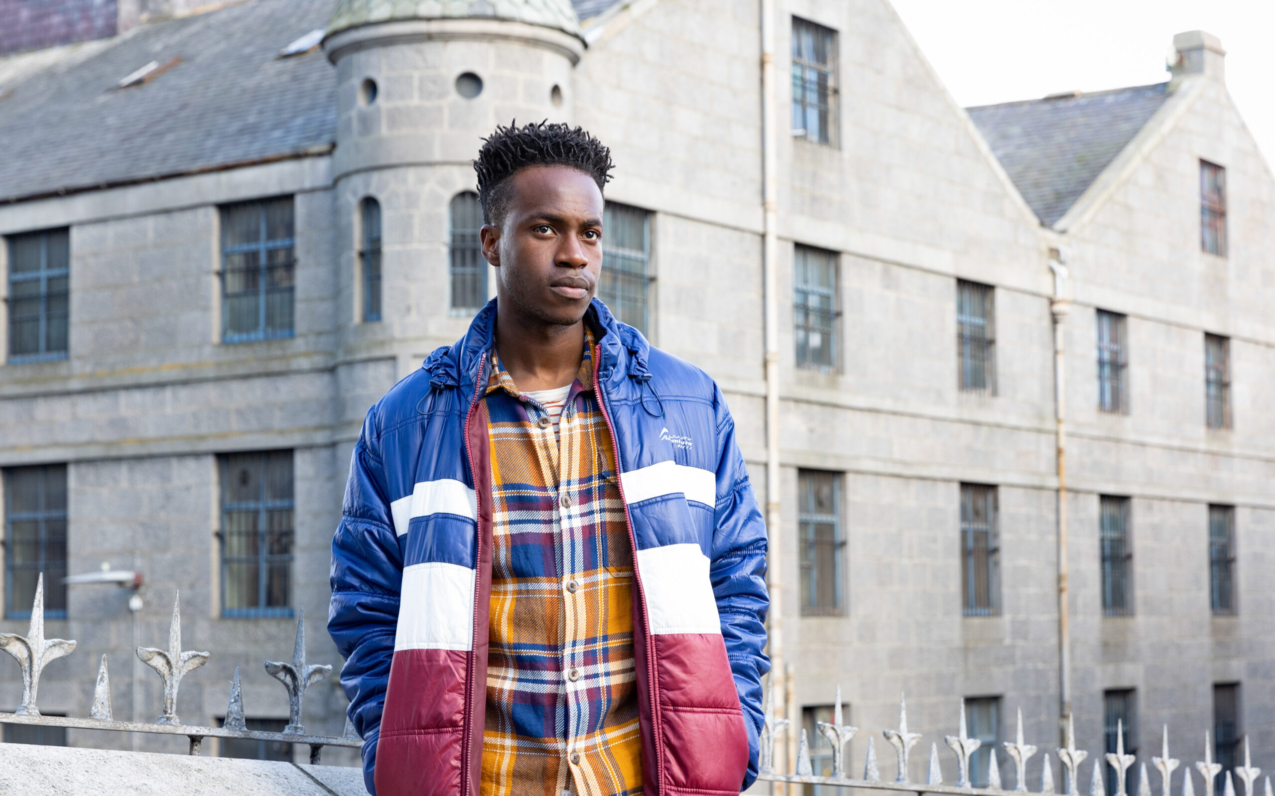 Davis Lindo walks through Aberdeen in Granite Harbour