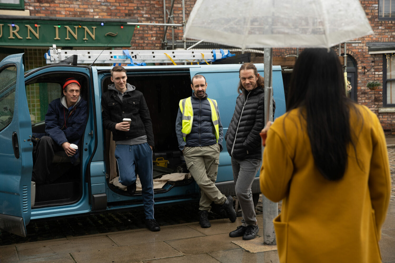 Griff and his friends look smug at Alya in Coronation Street