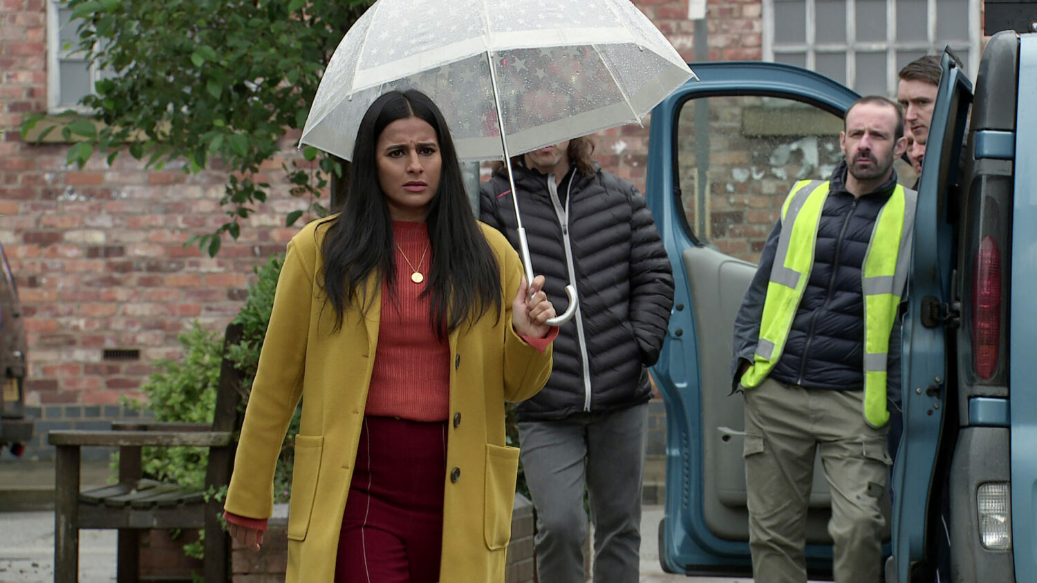 Alya looks upset as she walks away from Griff and his friends in Coronation Street