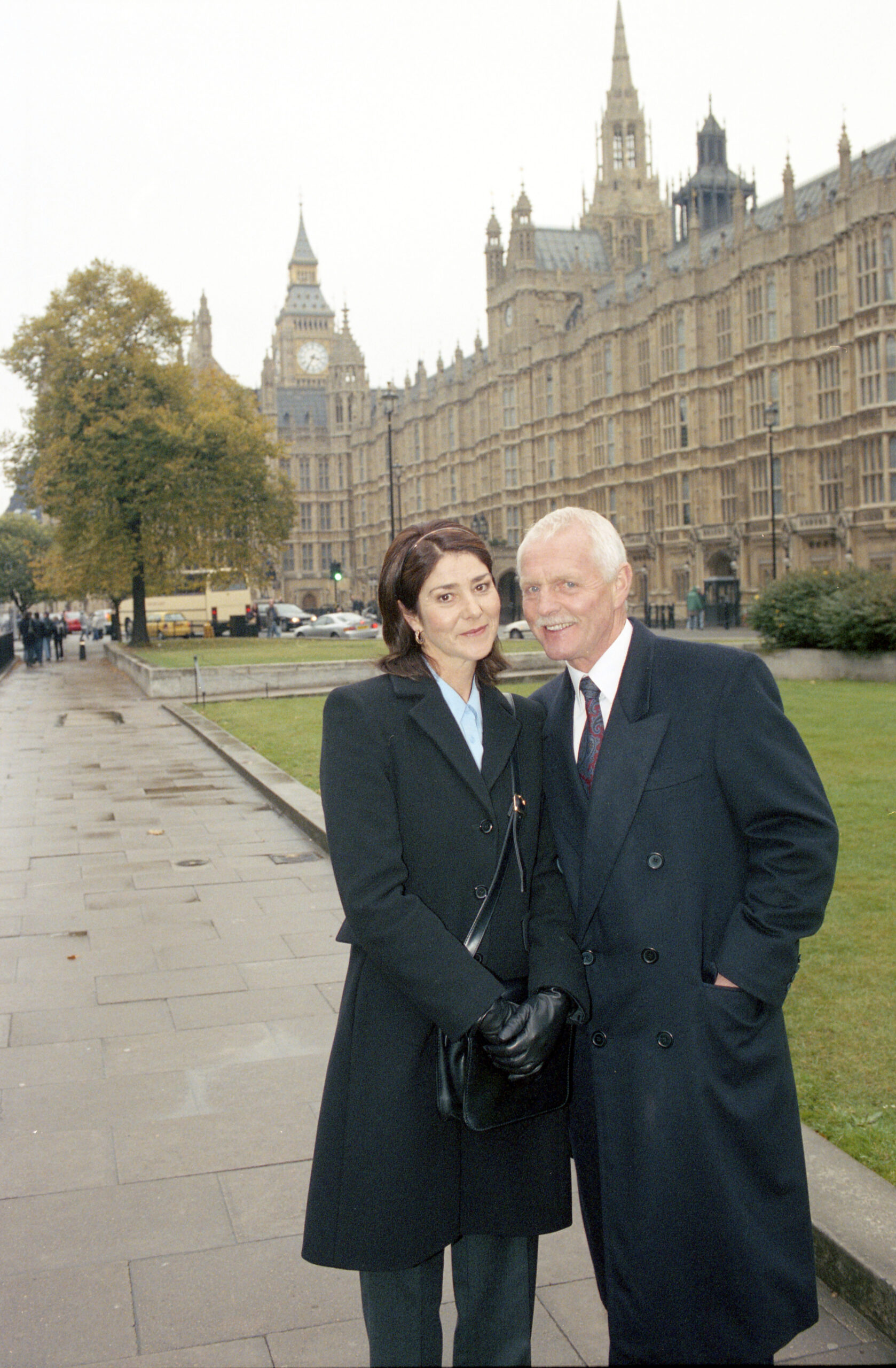 Gloria and Eric Pollard with the Houses Of Parliament behind them