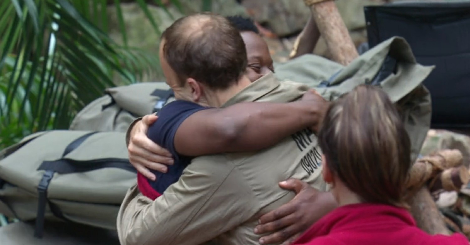 Matt Hancock hugging Babatunde Aleshe in the jungle