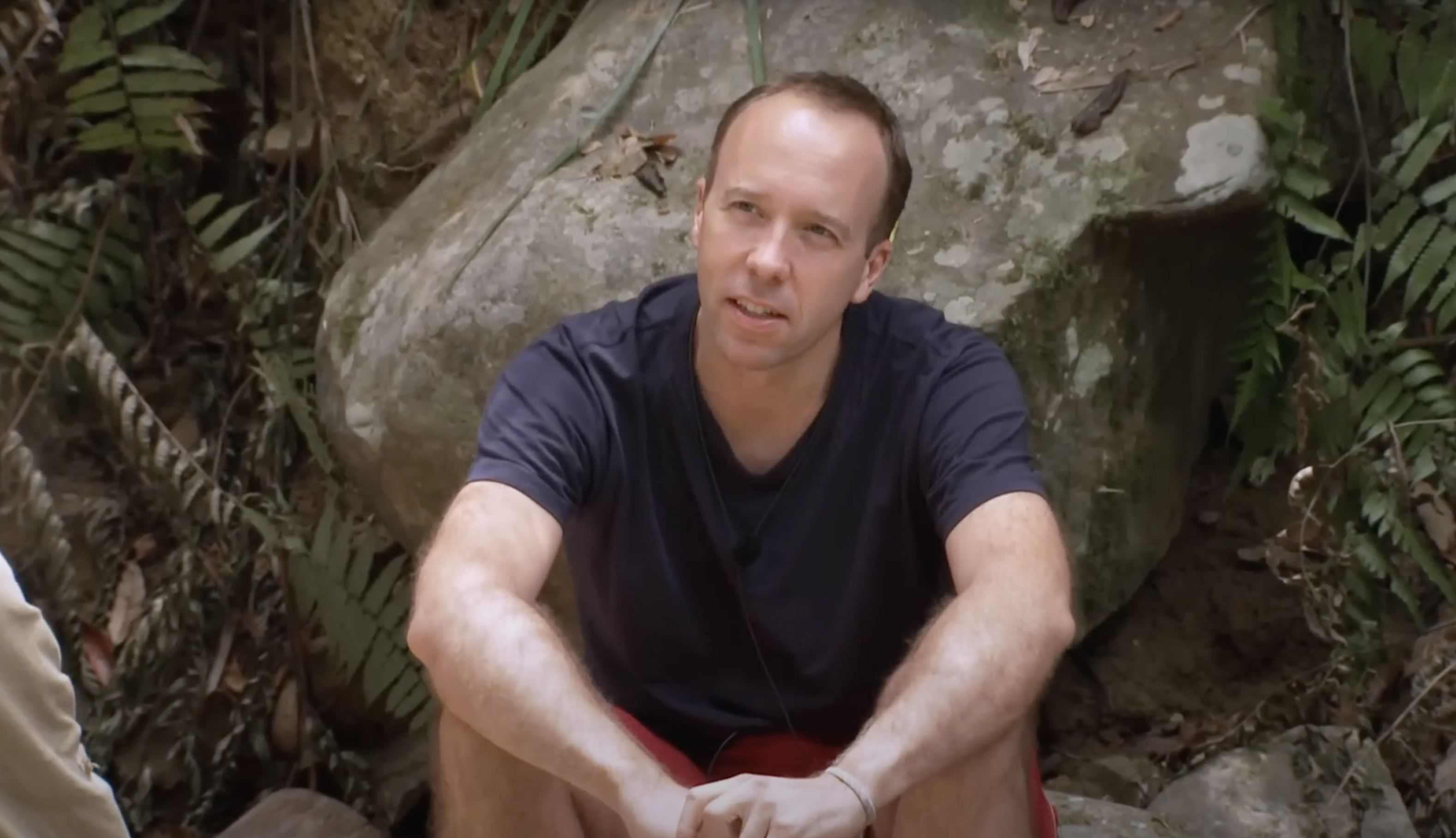 Matt Hancock sat in the jungle on I'm A Celebrity 2022