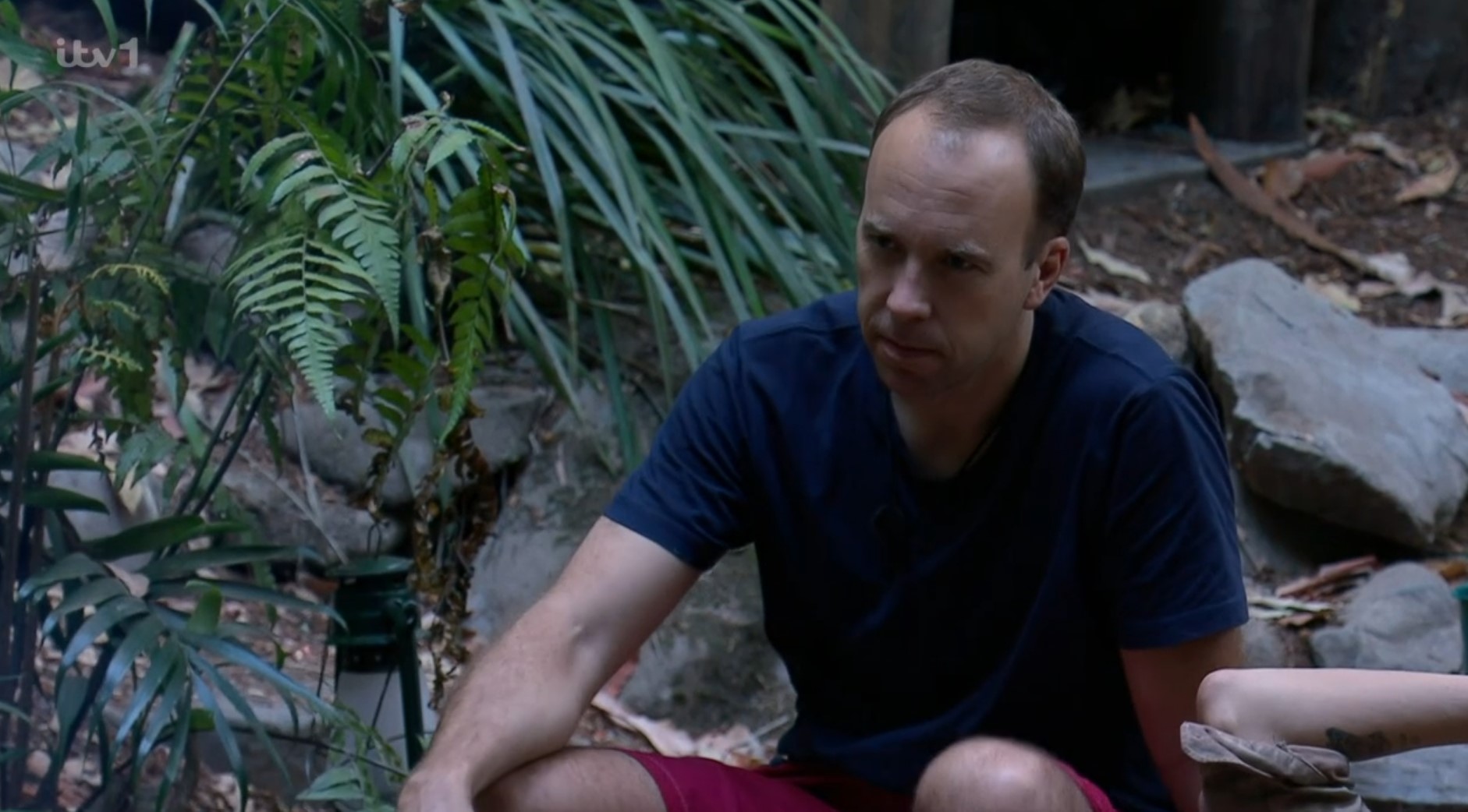 Matt Hancock looks serious round the I'm A Celebrity campfire