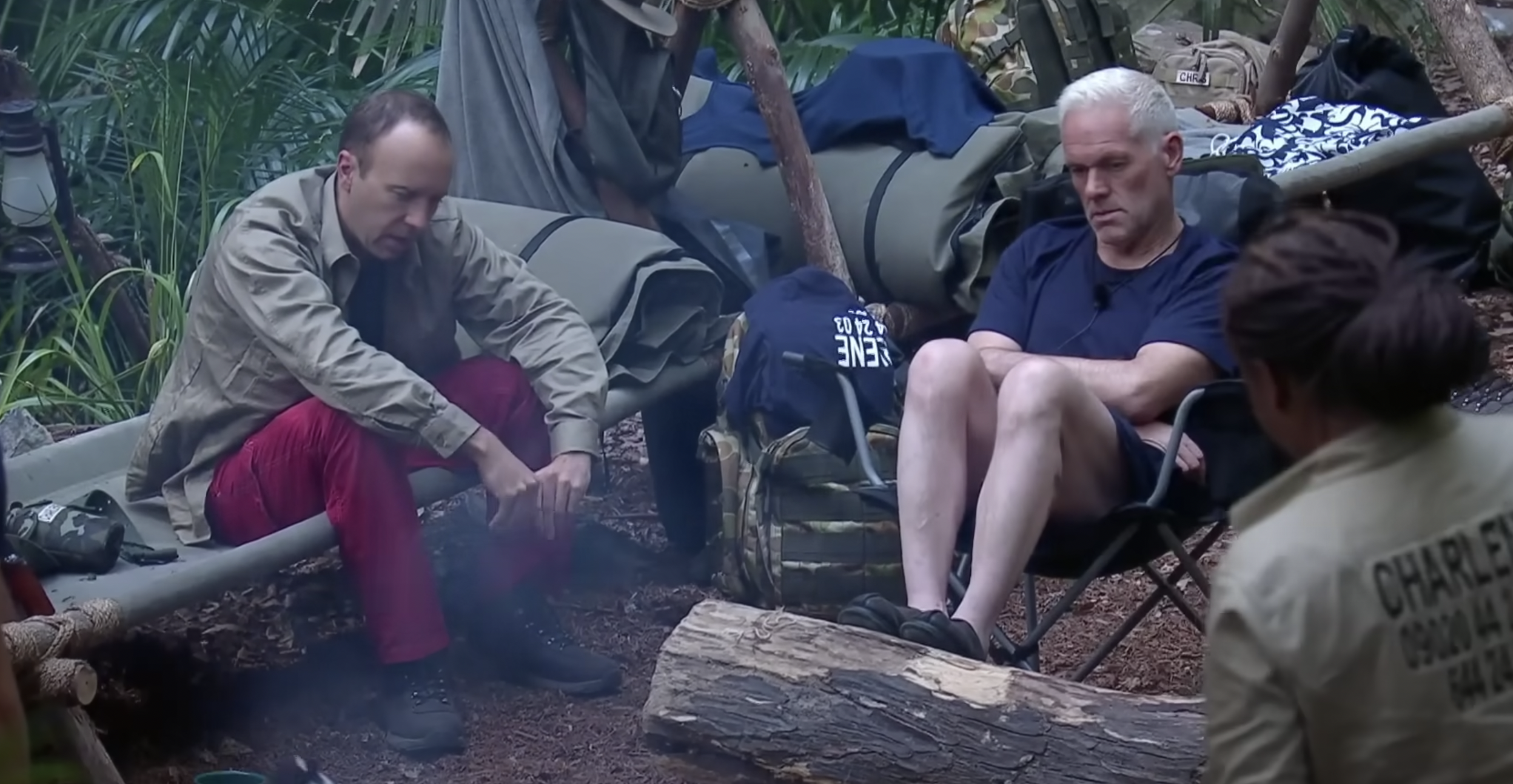Matt Hancock and Chris Moyles sit near each other in the I'm a Celebrity jungle