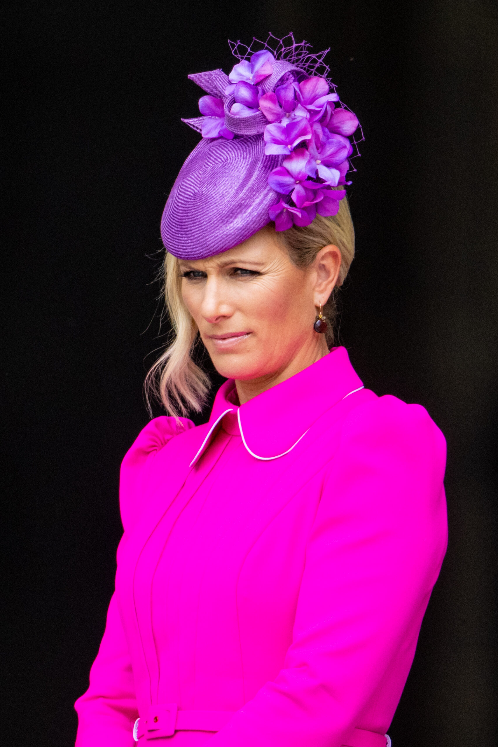 Zara Tindall in bright pink dress and hat.