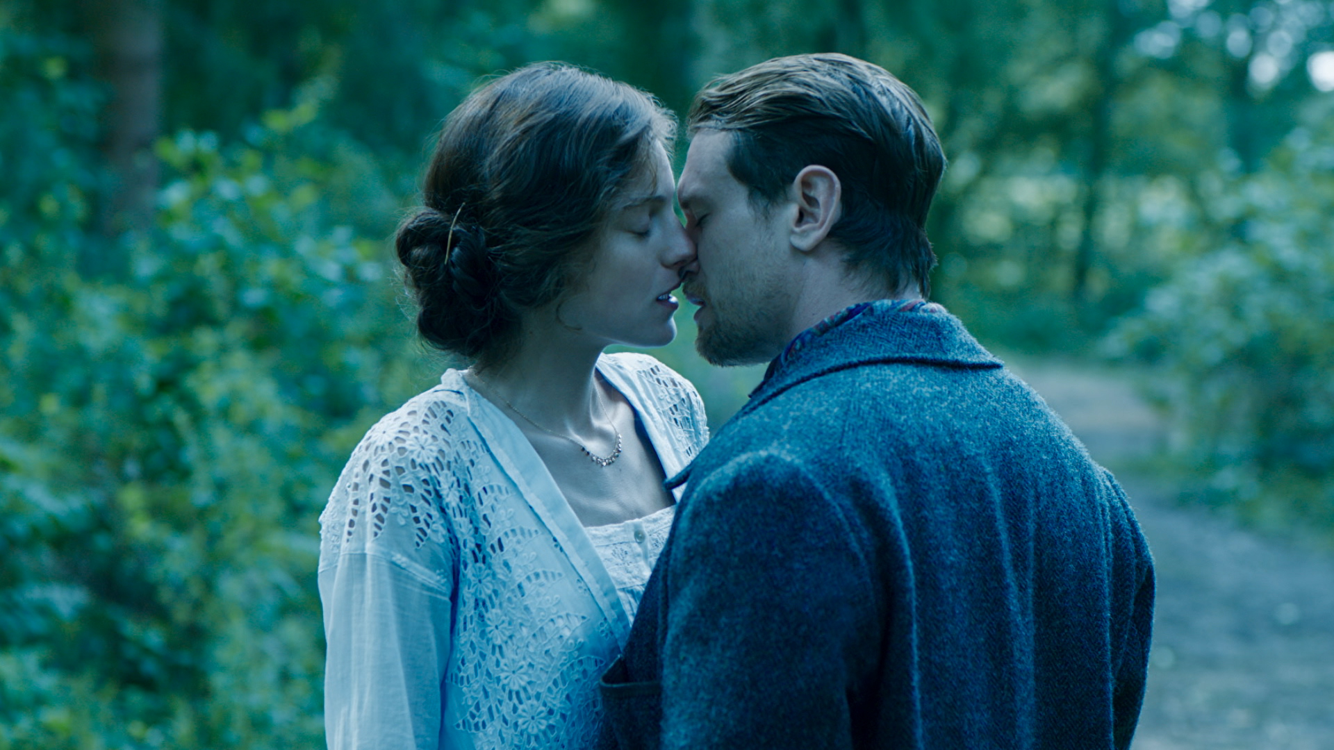 Connie and Oliver almost kiss in Lady Chatterley's Lover