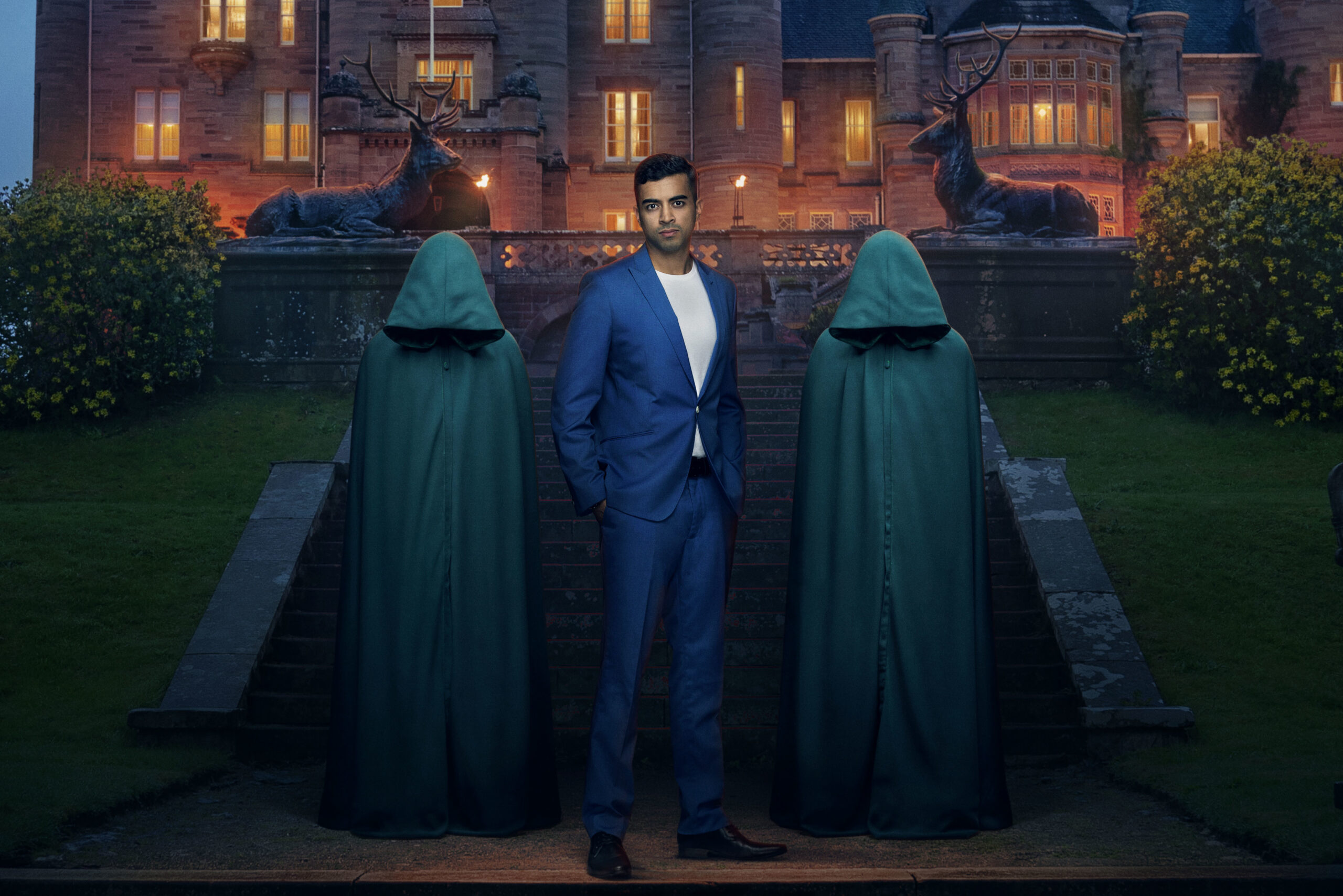 Imran stands between the two hoods