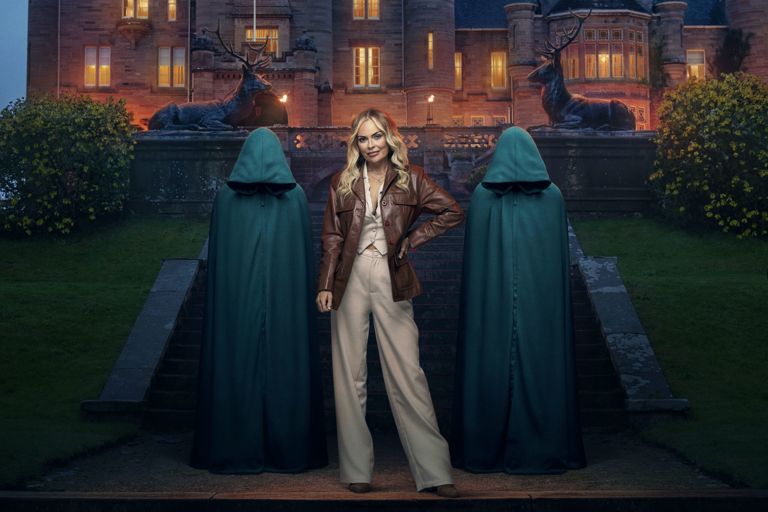 Contestant Claire poses with the two hoods