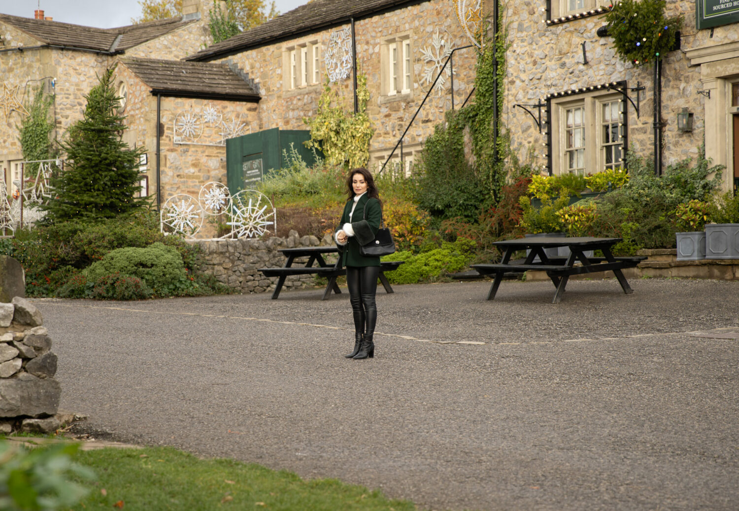 Leyla stands alone in the village on Emmerdale 