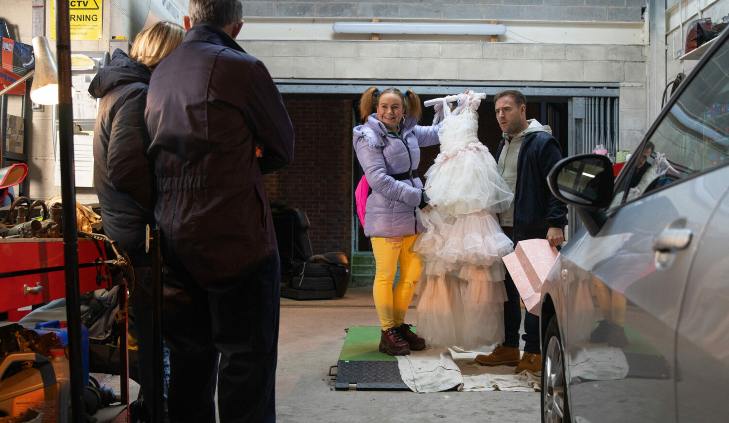 Coronation Street: Abi and Kevin cuddle as thrilled Gemma and worried Tyrone show them an awful bride's dress in the garage