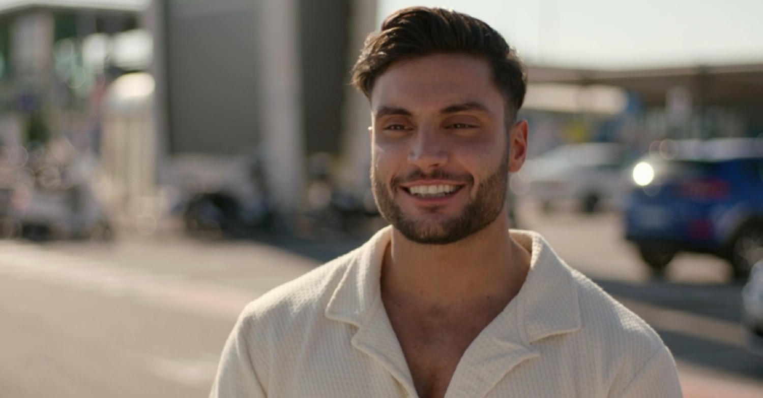 Davide Sanclimenti smiling on Ekin-Su and Davide Homecomings 