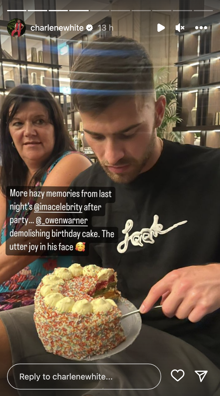 Owen Warner eating a birthday cake at the I'm A Celeb 2022 wrap party 