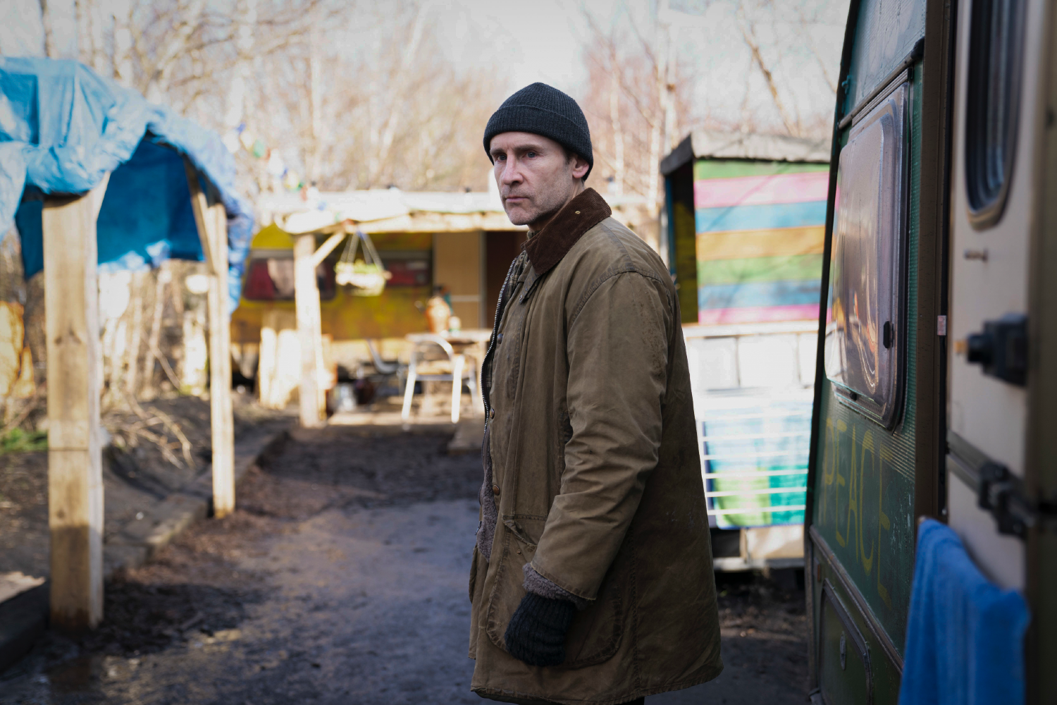Cal MacAninch wearing a beanie in Vigil