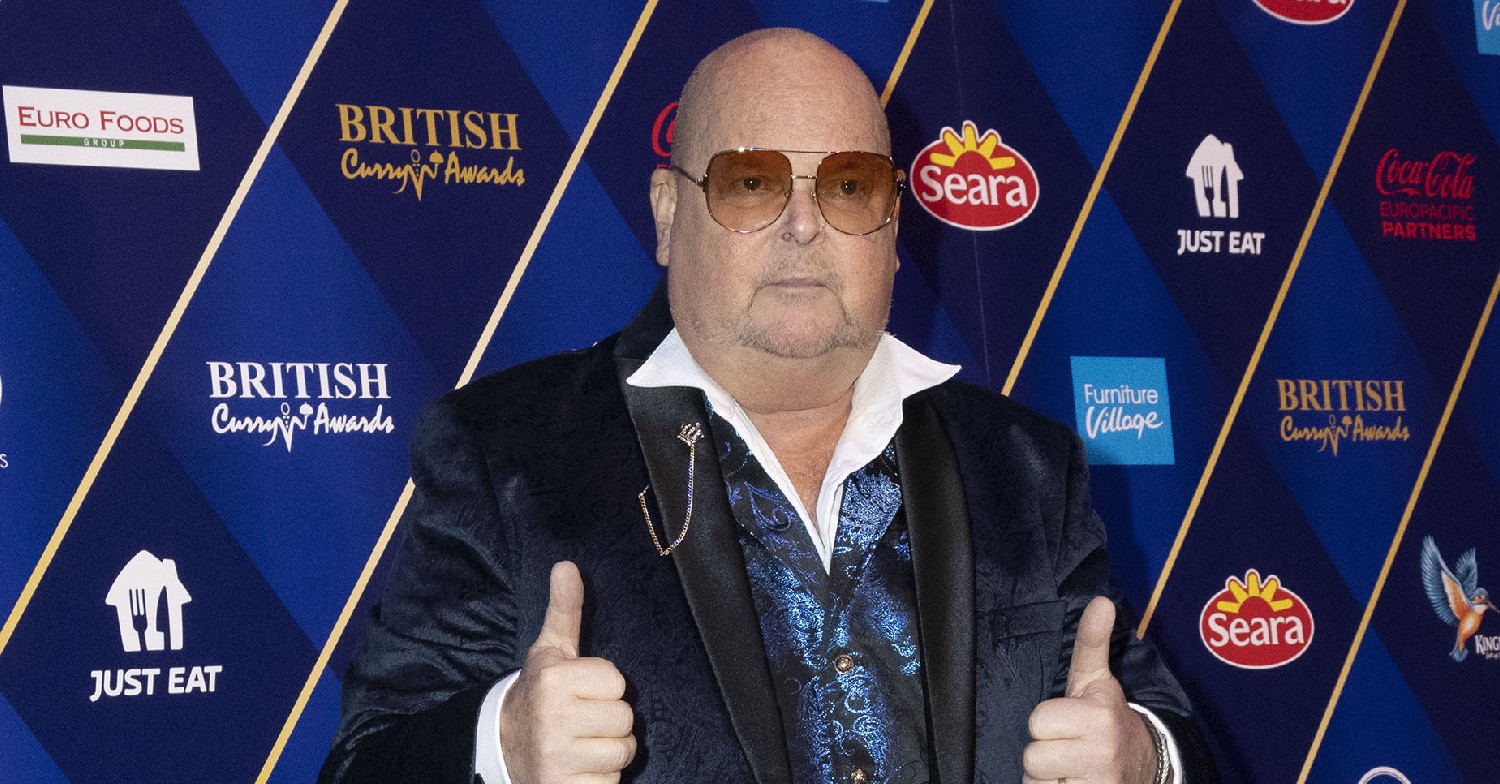 James Whale of Big Brother giving the thumbs up at a red carpet event 