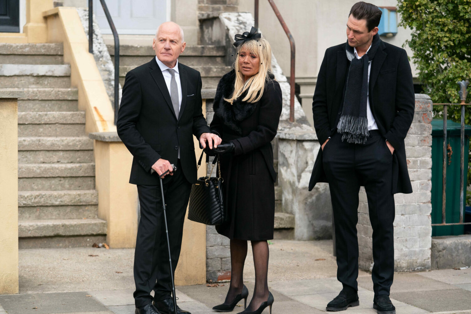 EastEnders: Colin and Sharon hold hands as Zack looks on