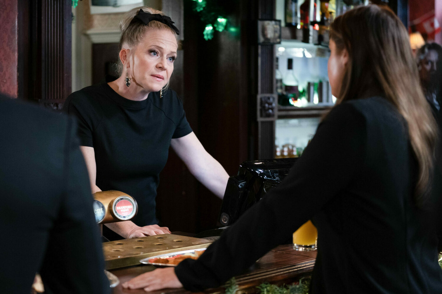 Linda looks defiant when confronted by Lauren in the Vic on EastEnders