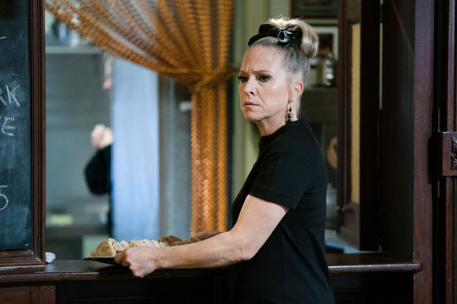 Linda looks worried on EastEnders