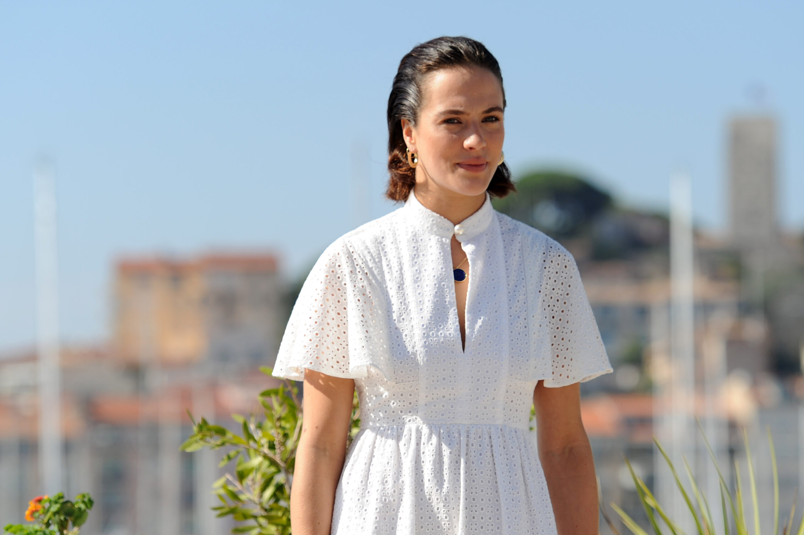 Jessica Brown Findlay wearing white and smiling